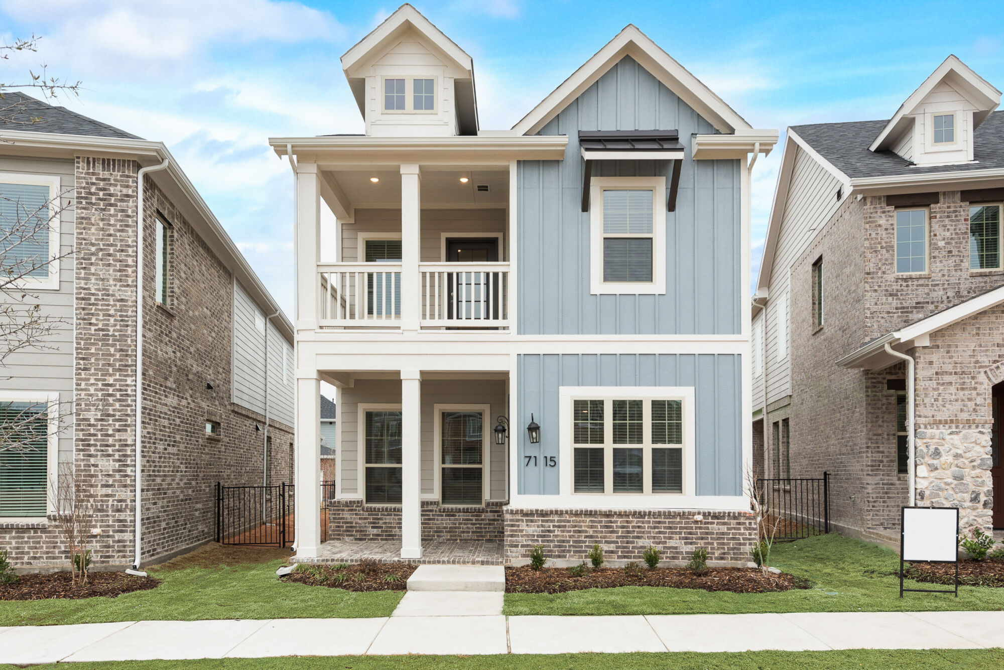 Elevation Front with window, door and exterior brick