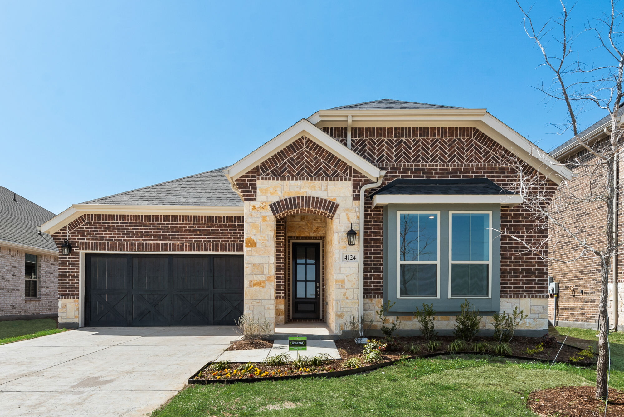 Elevation Front with window, garage and door