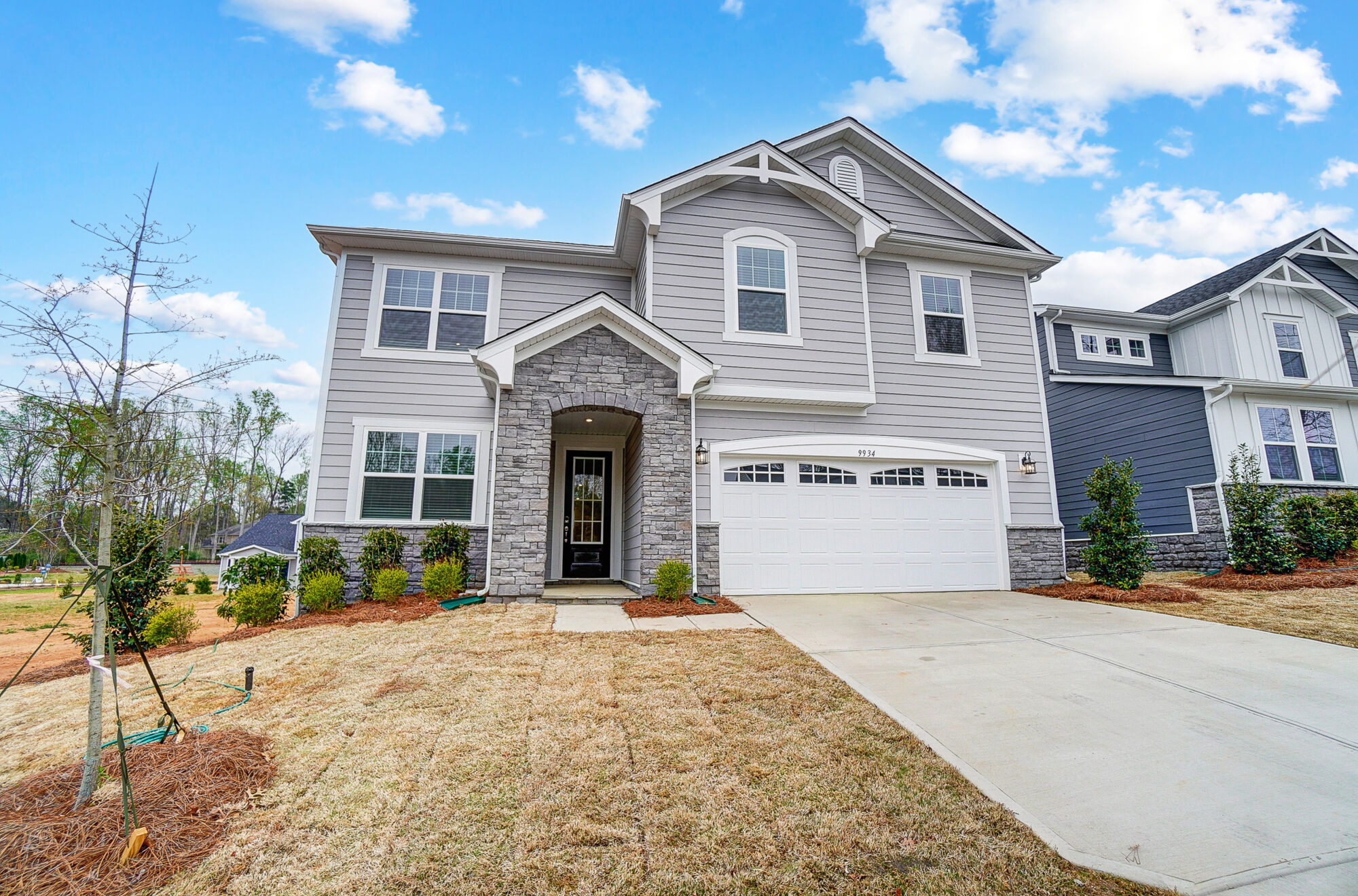 Front exterior and 2-car garage