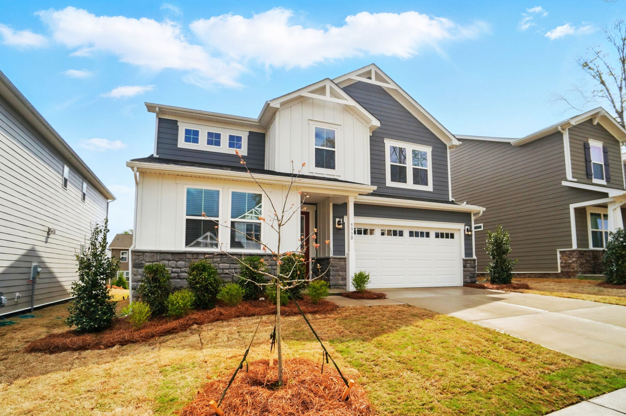 Front exterior with 2-car garage