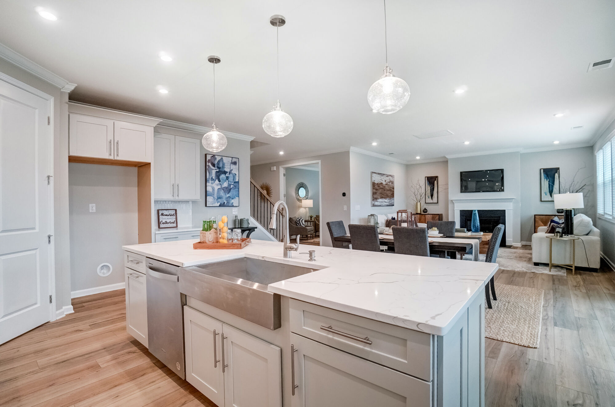 Kitchen with dining area and great room beyond