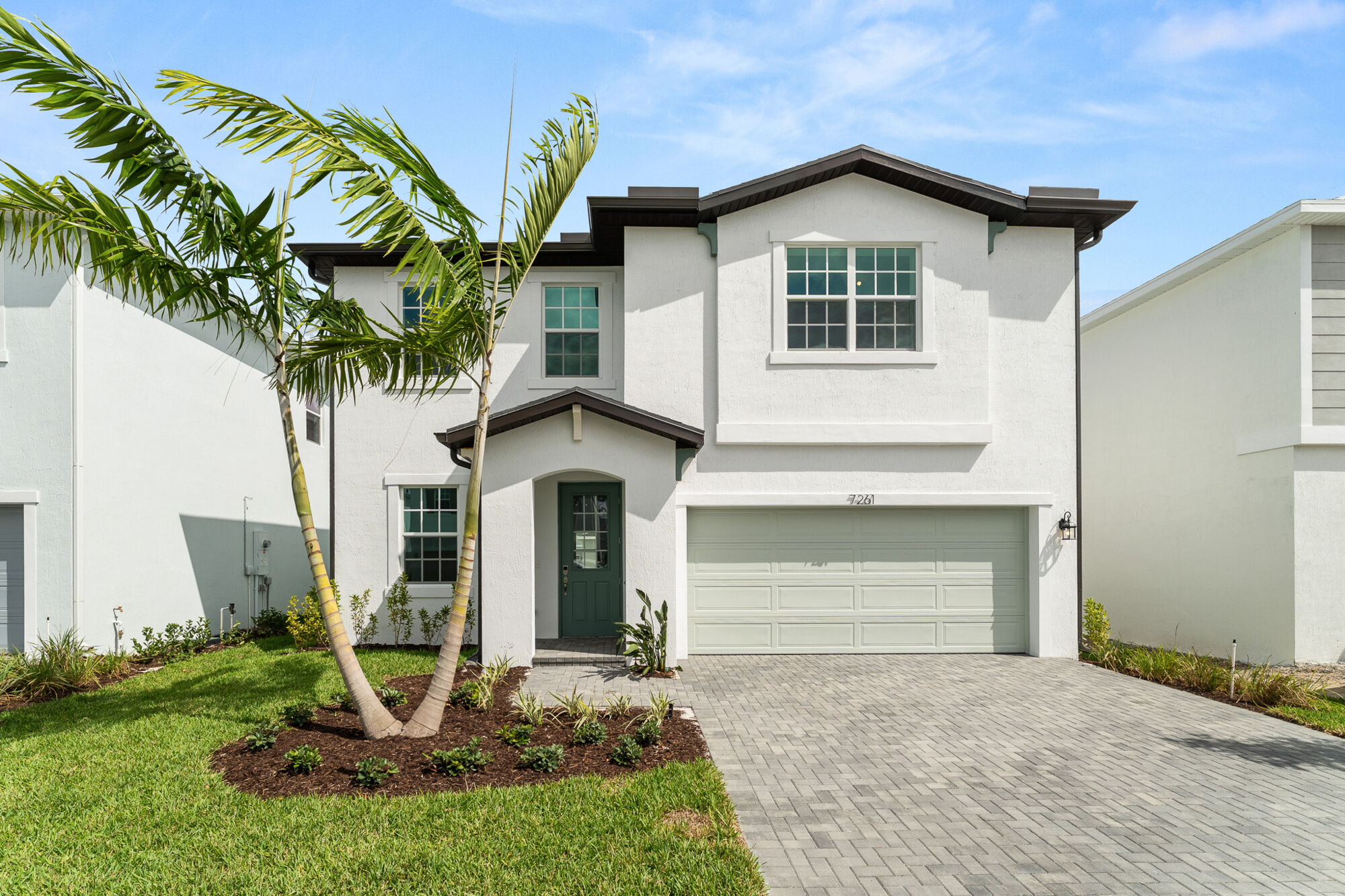  Elevation Front with window, garage and door