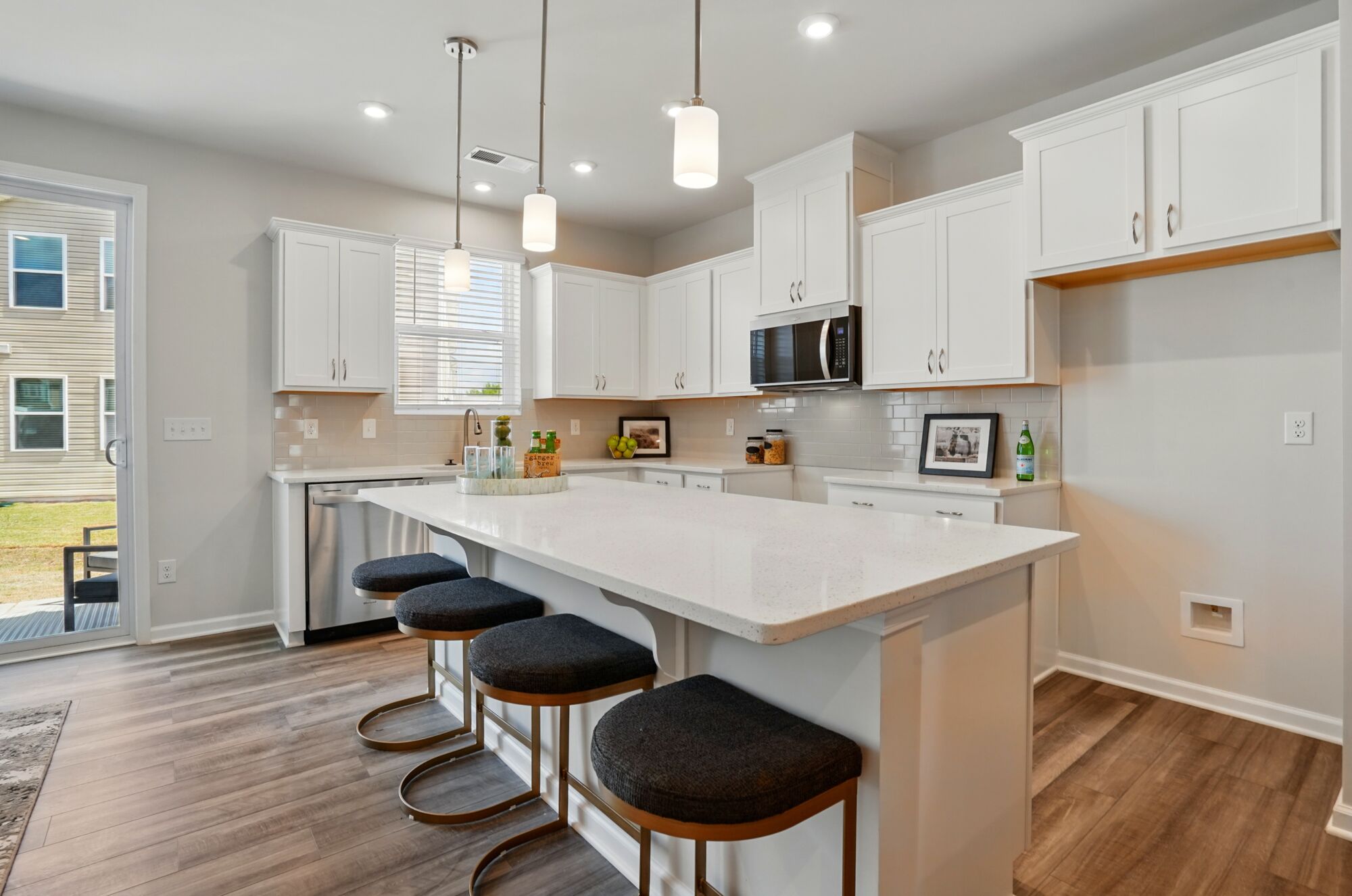 Kitchen with island breakfast bar
