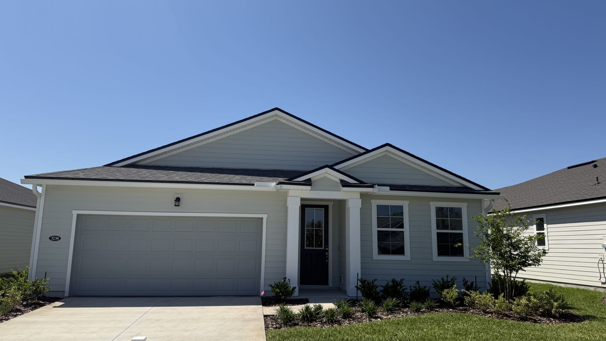  Elevation Front with garage, window and door