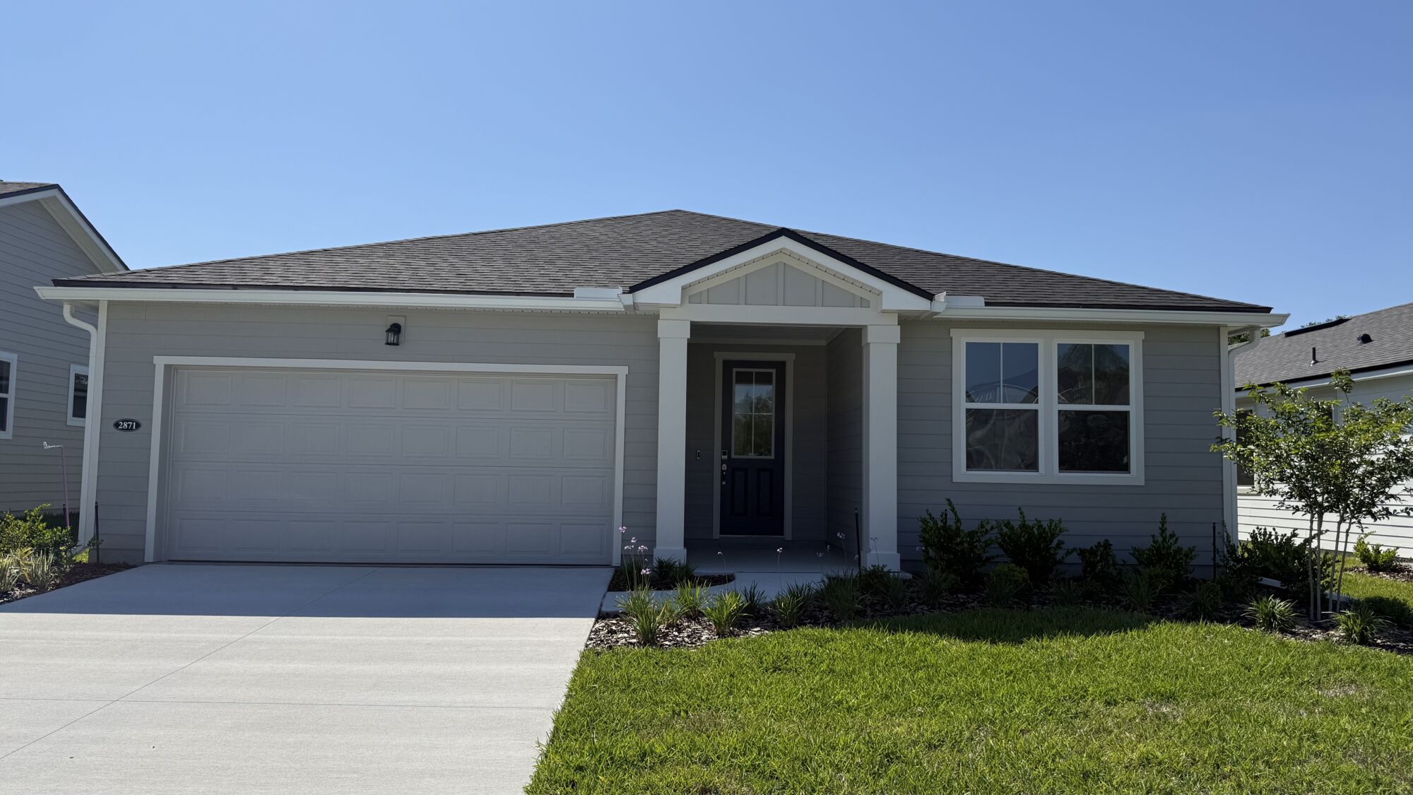  Elevation Front with garage, window and door