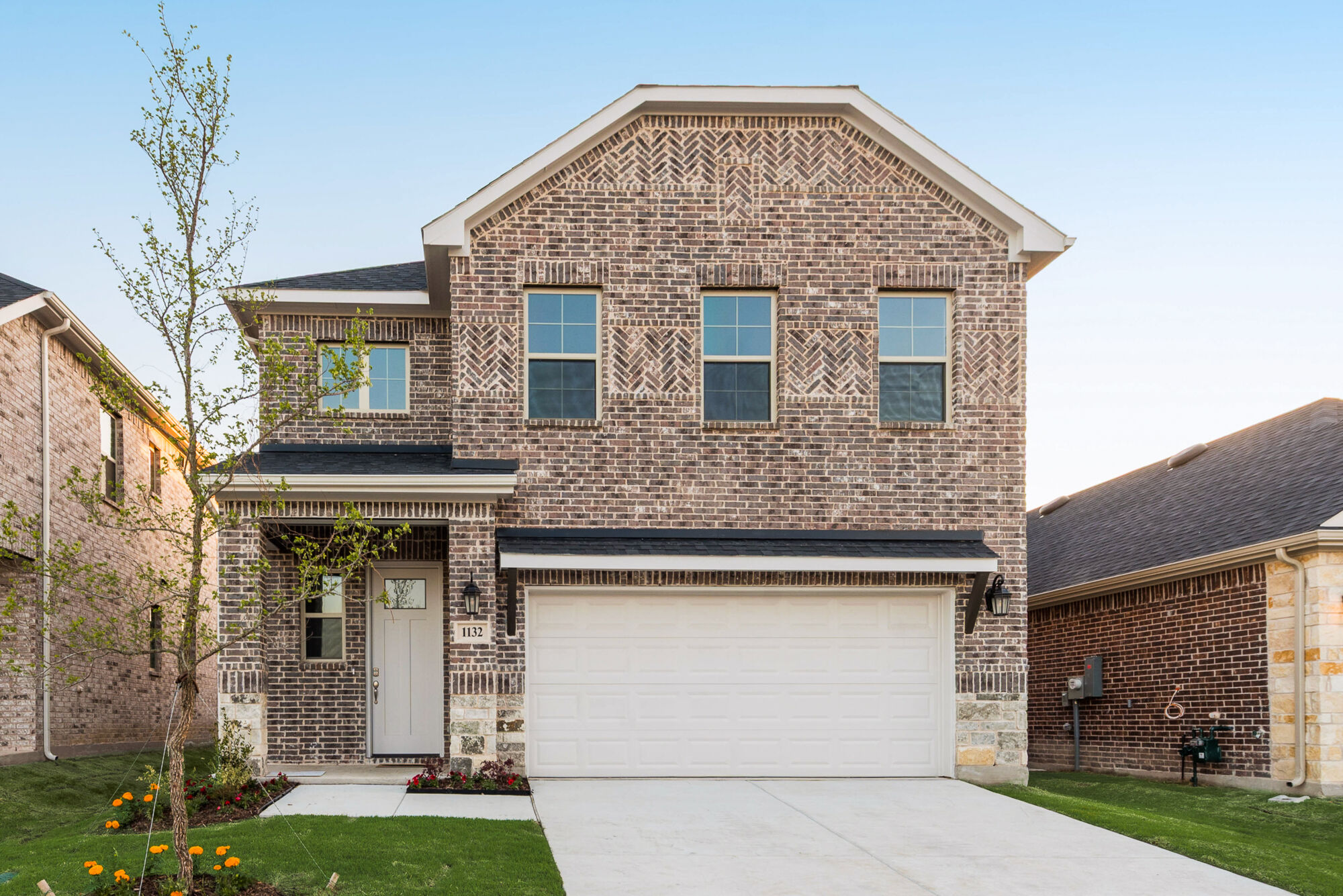 Elevation Front with window, door and garage