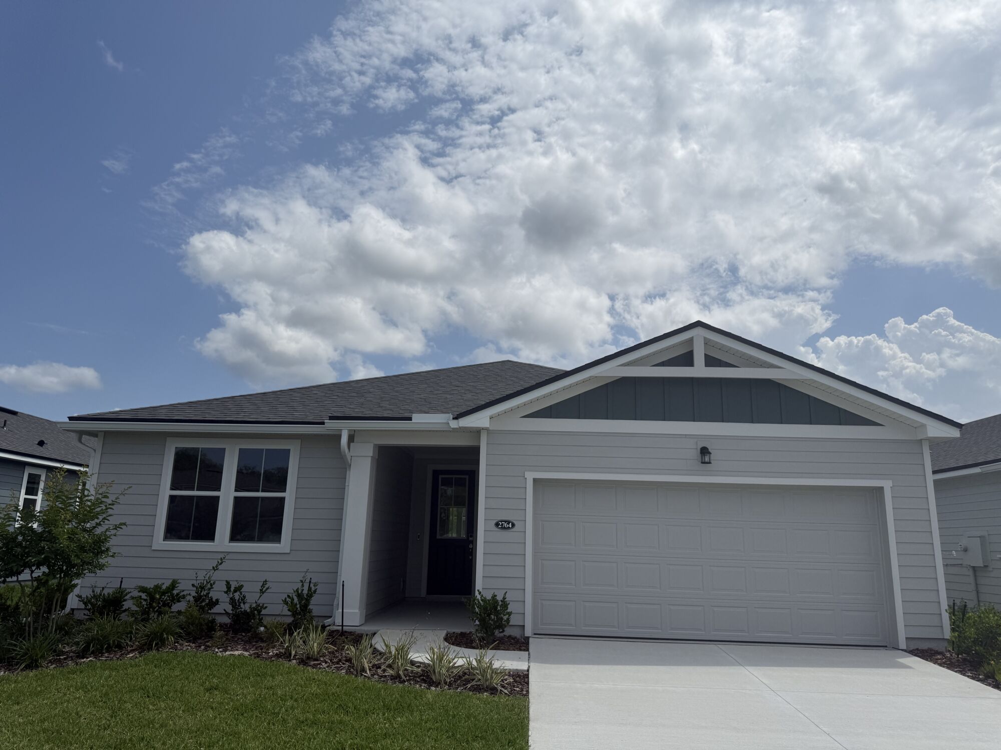  Elevation Front with garage, window and door