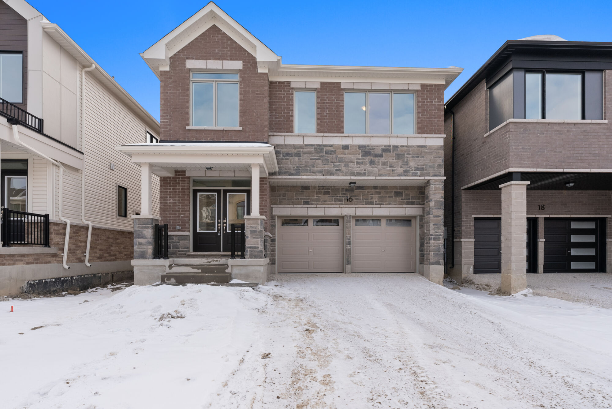  Elevation Front with garage, door and window
