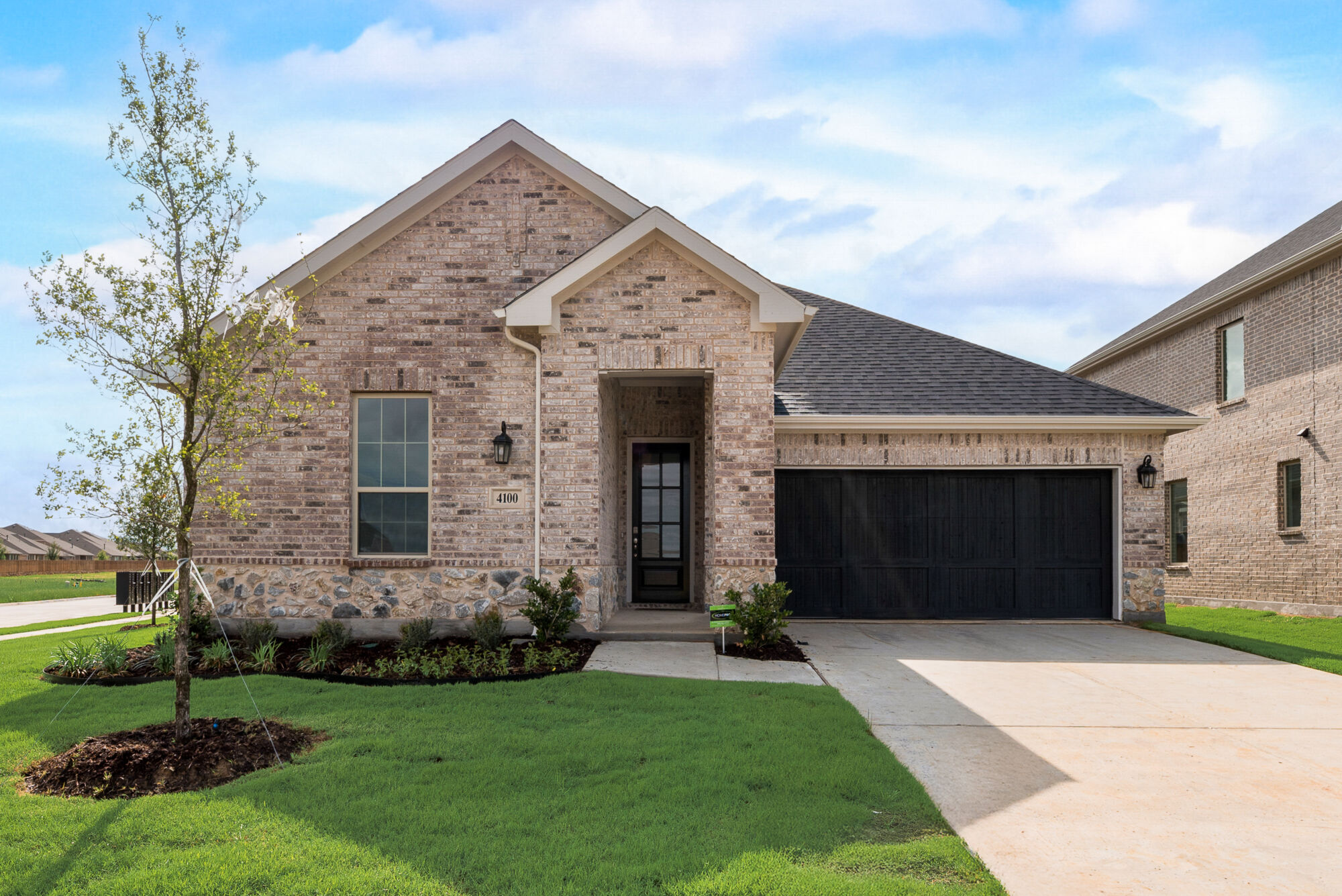 Elevation Front with window, garage and door