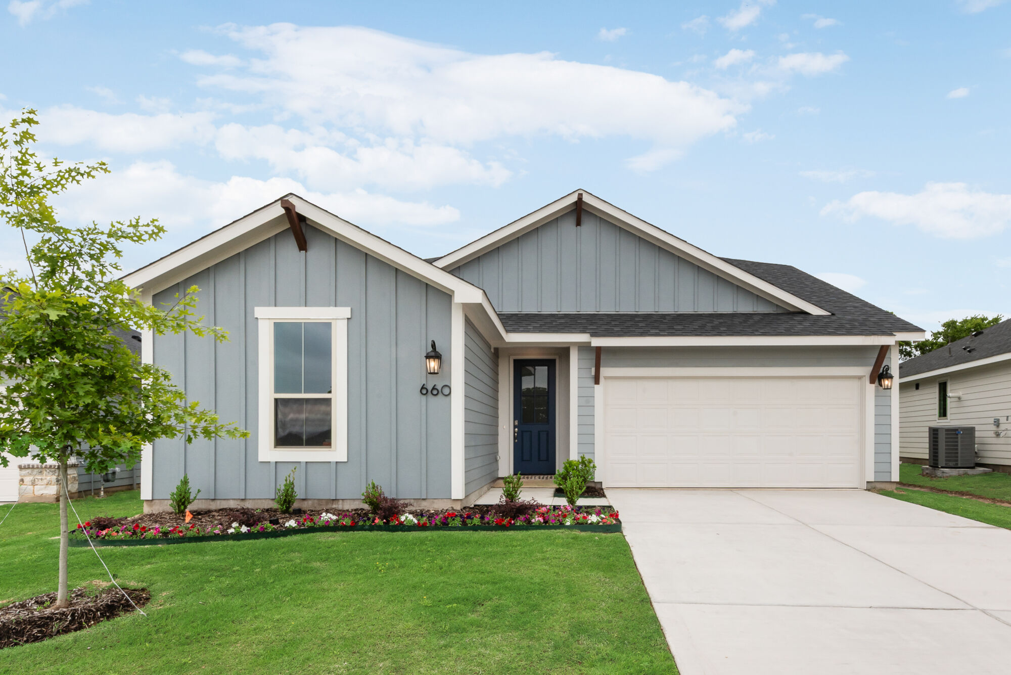 Elevation Front with window, garage and door
