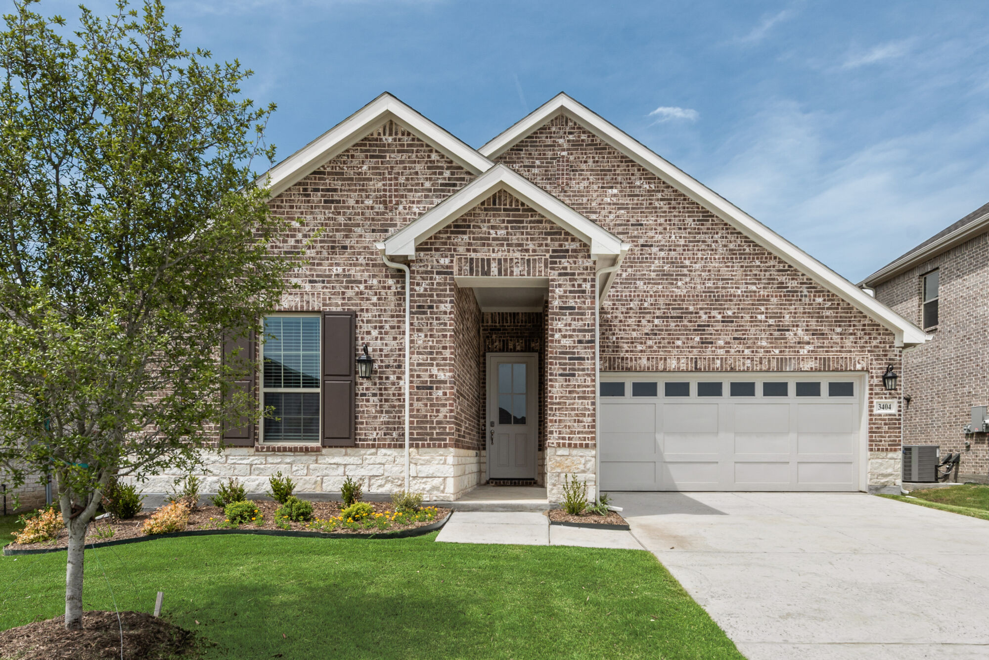 Elevation Front with window, garage and door