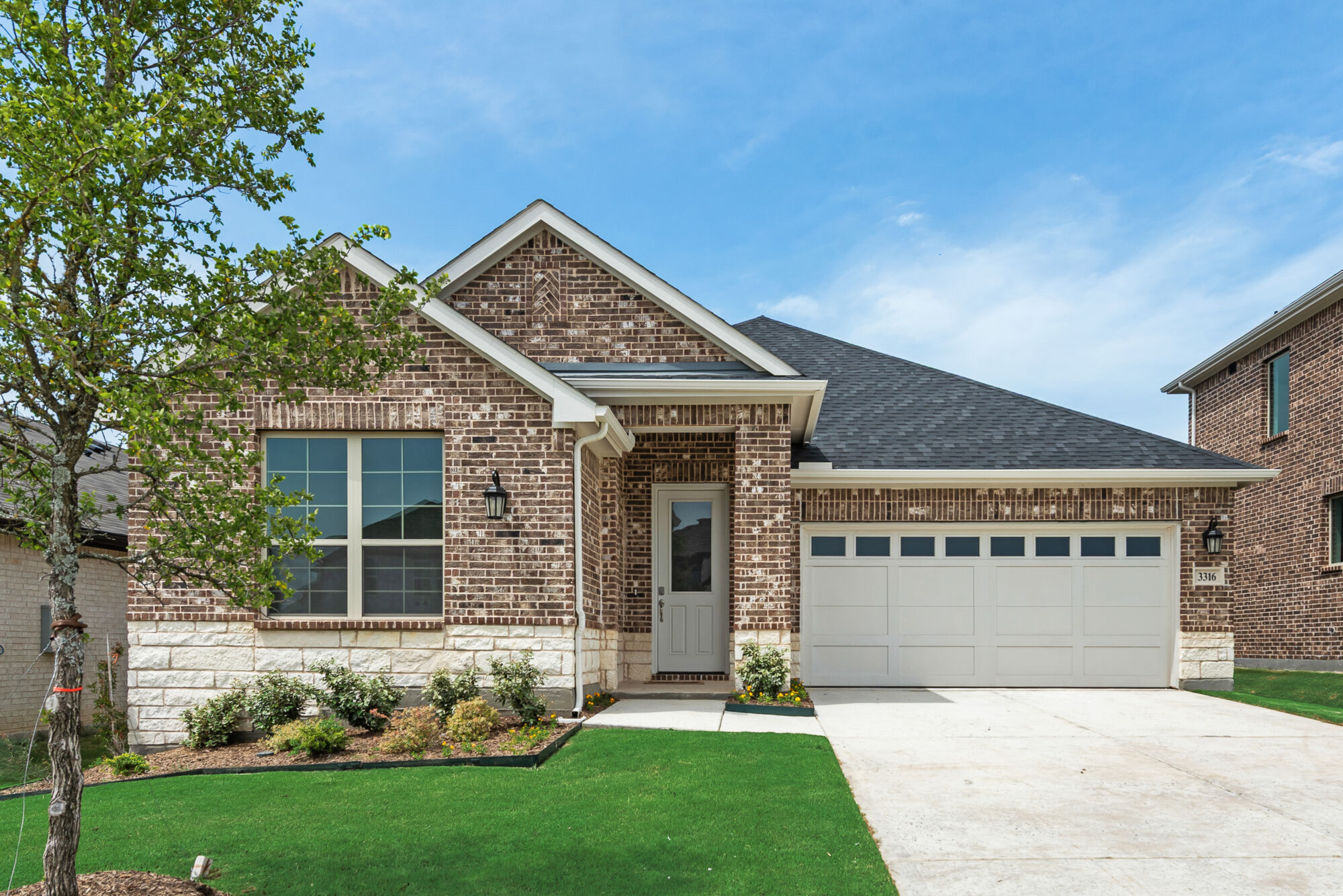 Elevation Front with garage, window and door