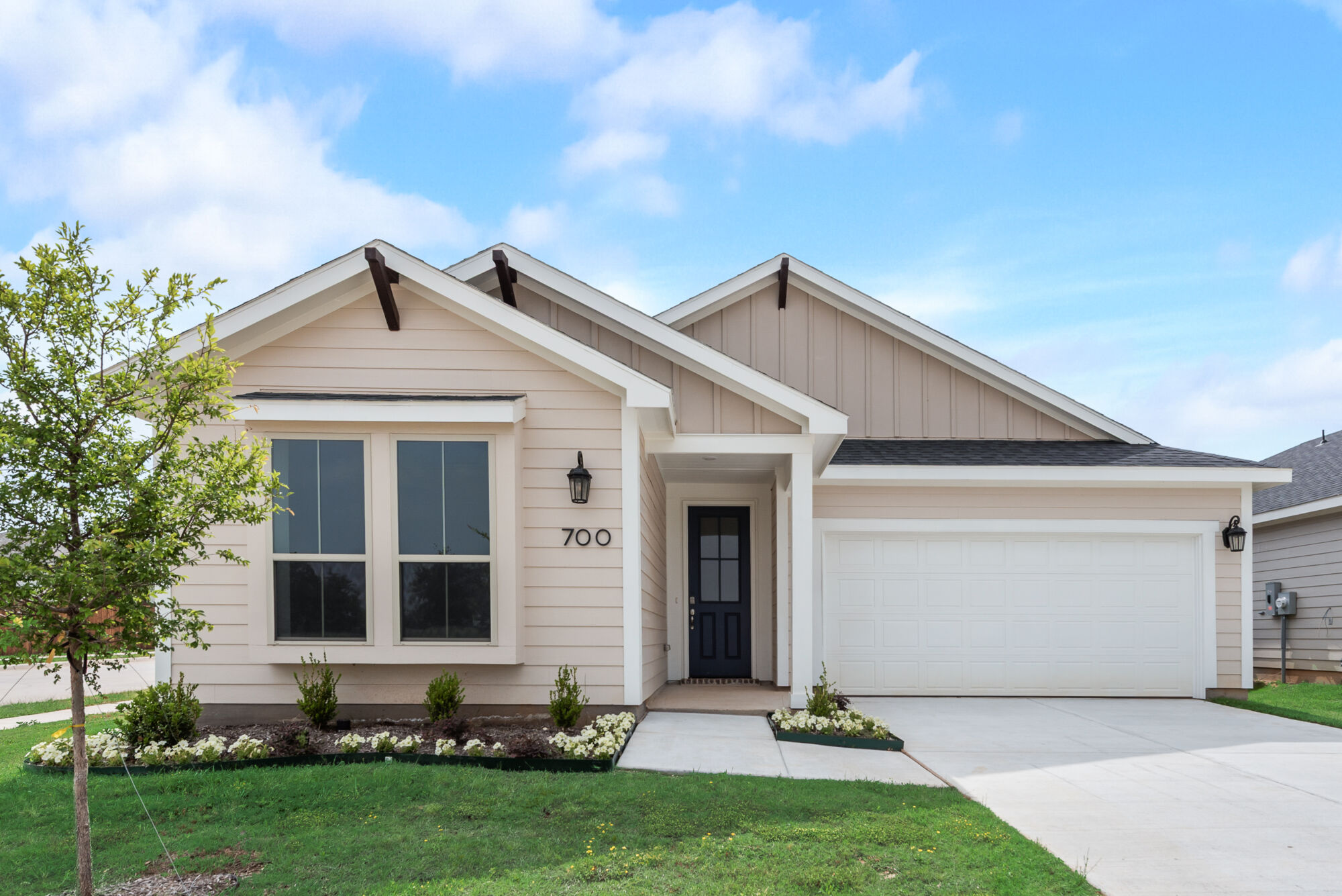 Elevation Front with window, garage and door
