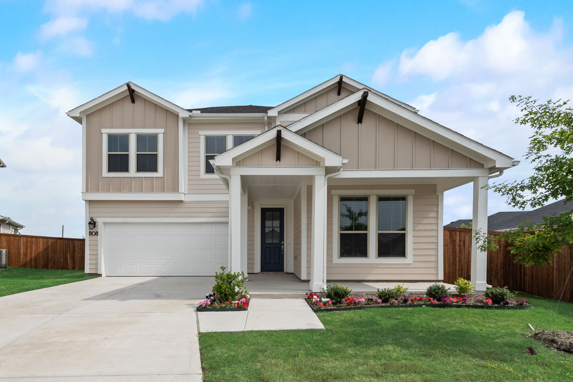 Elevation Front with window, garage and door