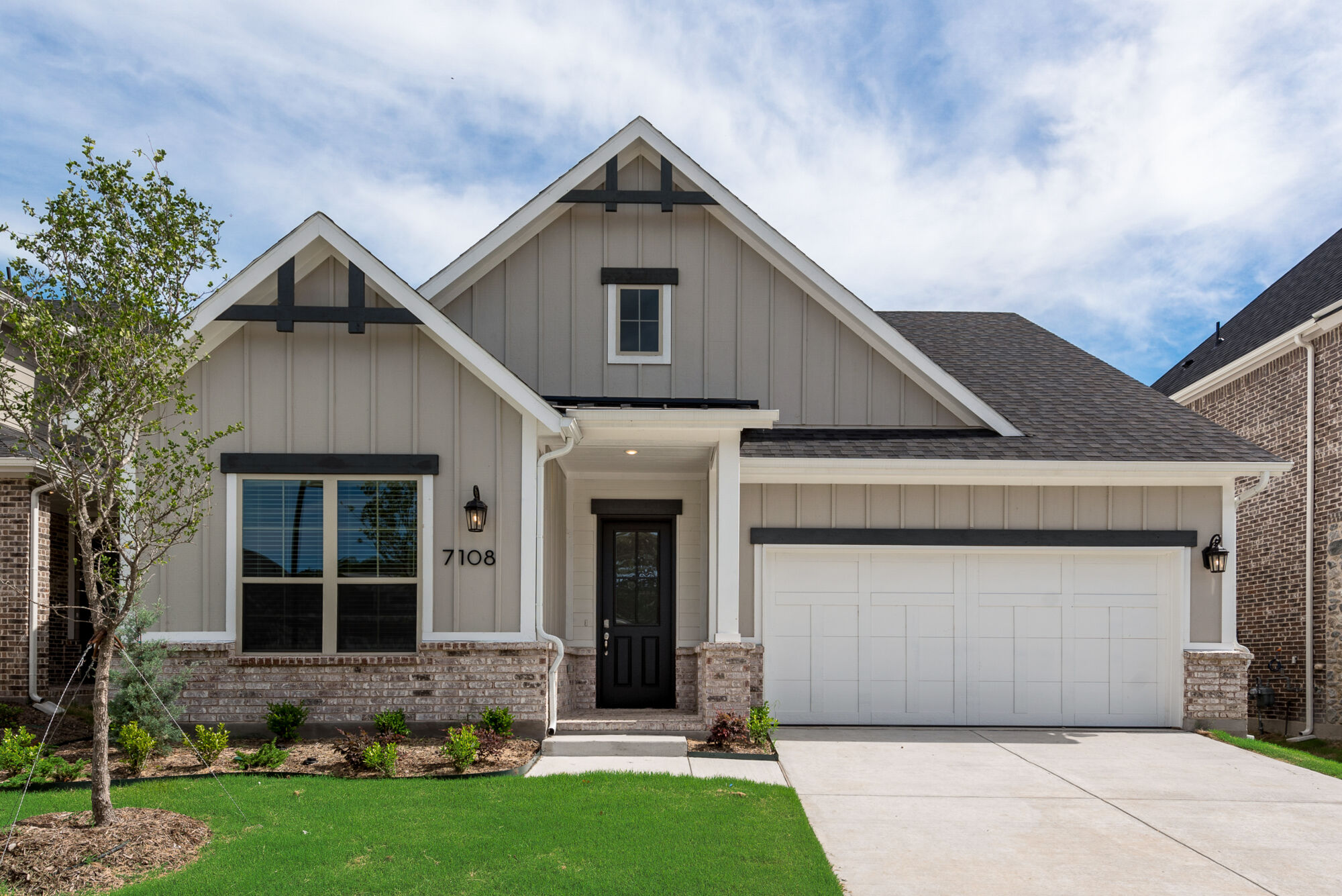 Elevation Front with garage, window and door