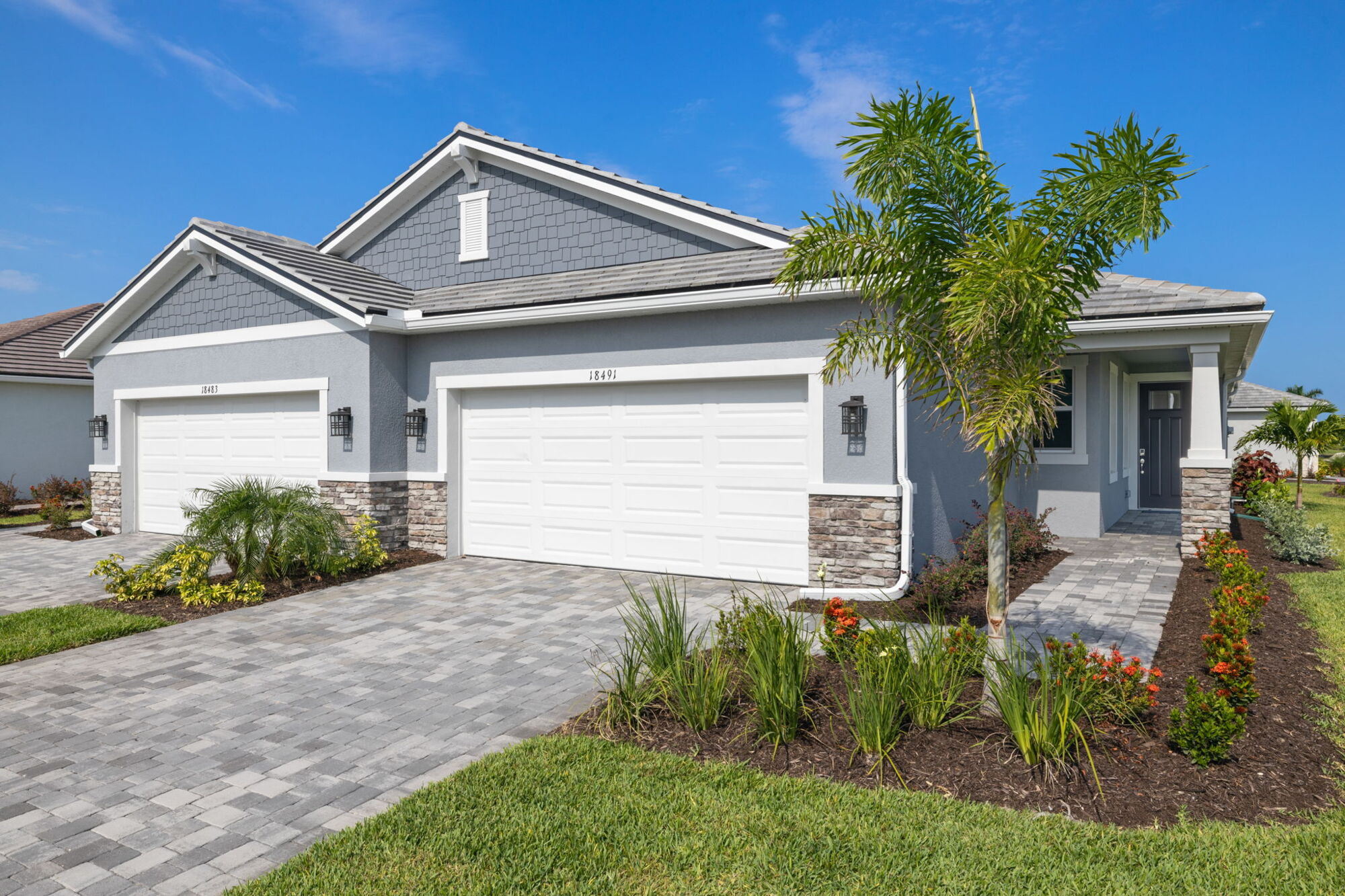  Elevation Front with garage and exterior stone