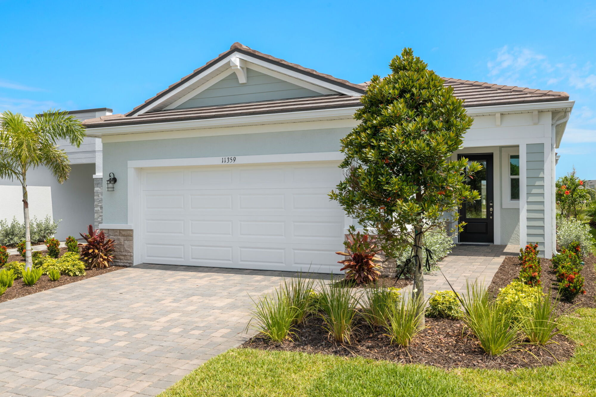  Elevation Front with garage, door and window