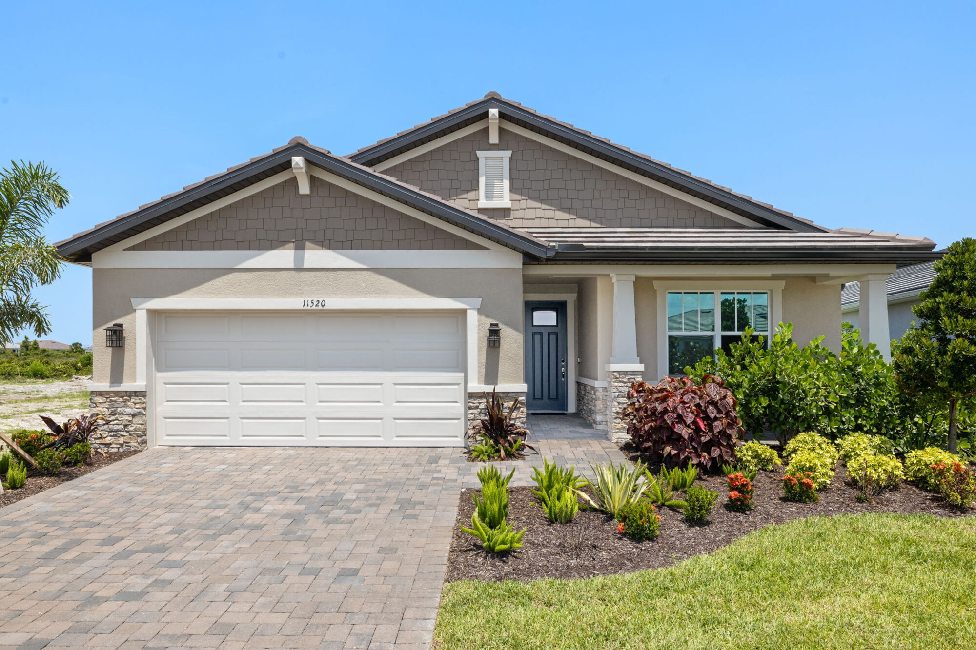  Elevation Front with garage, window and door