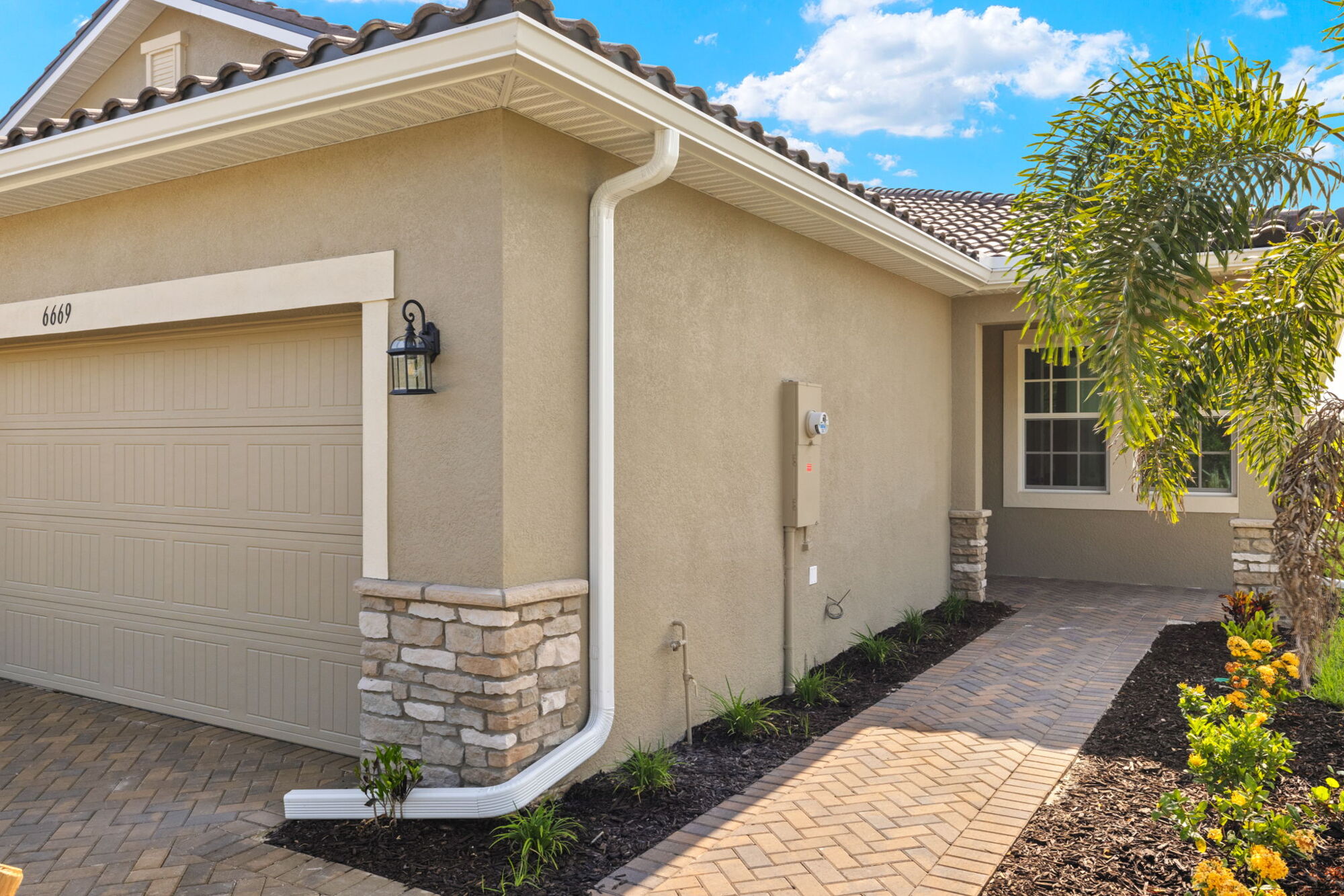  Front Porch with window, tile flooring and stone flooring
