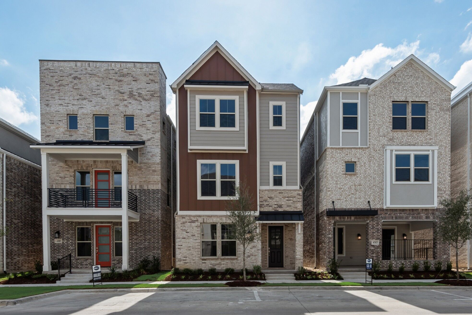 Elevation Front with window, door, exterior brick and exterior stone