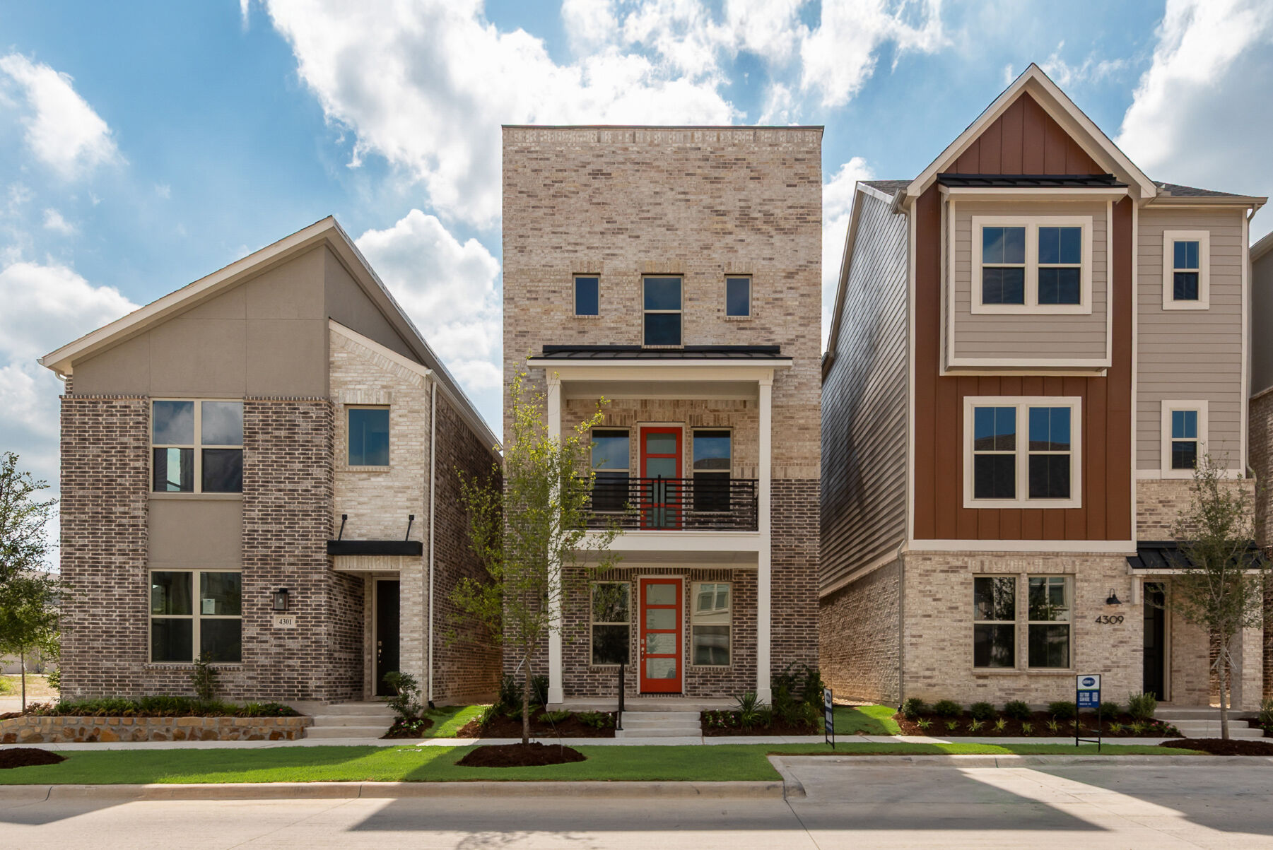 Elevation Front with window, door, exterior stone, exterior brick and exterior clapboard