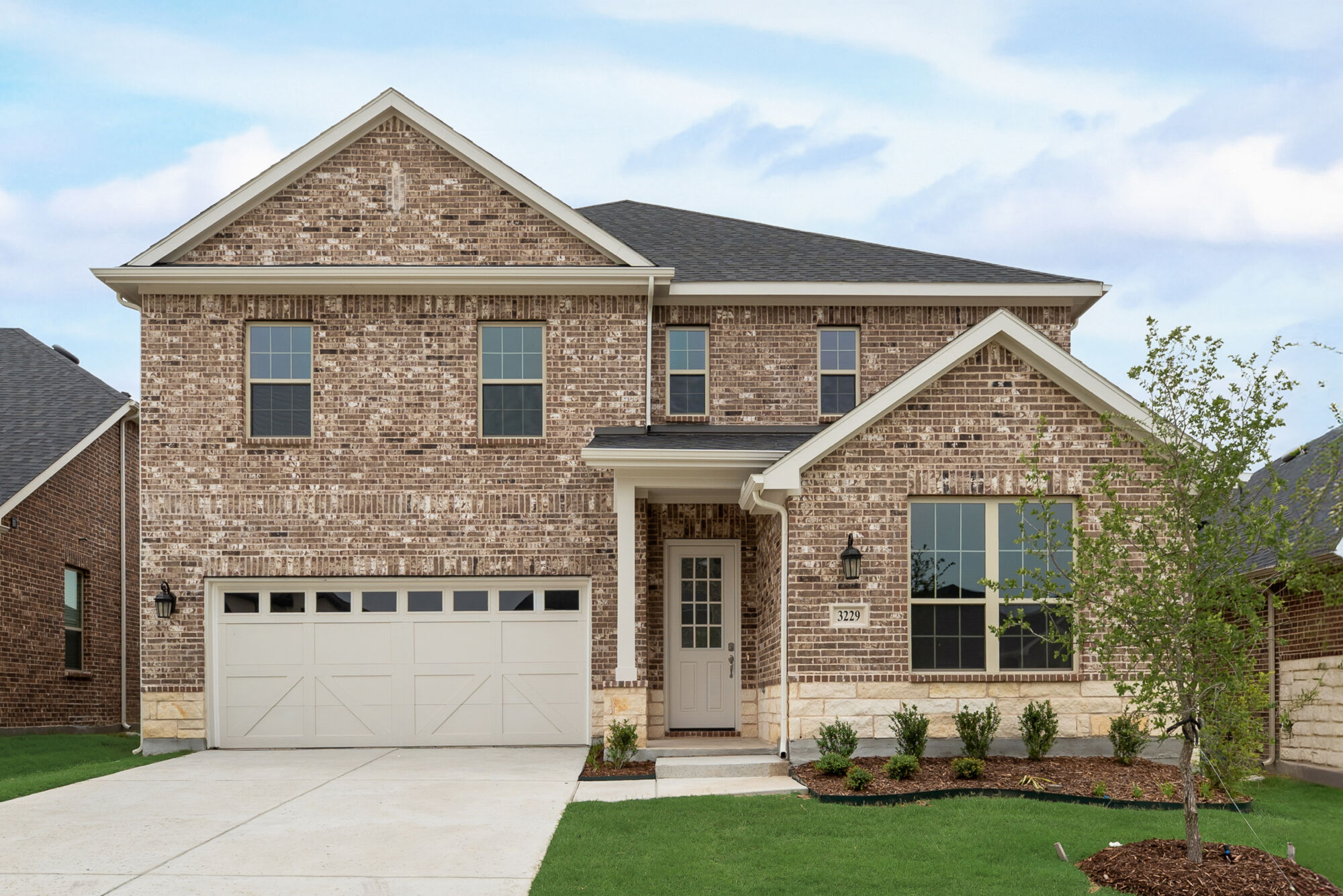 Elevation Front with window, garage and door