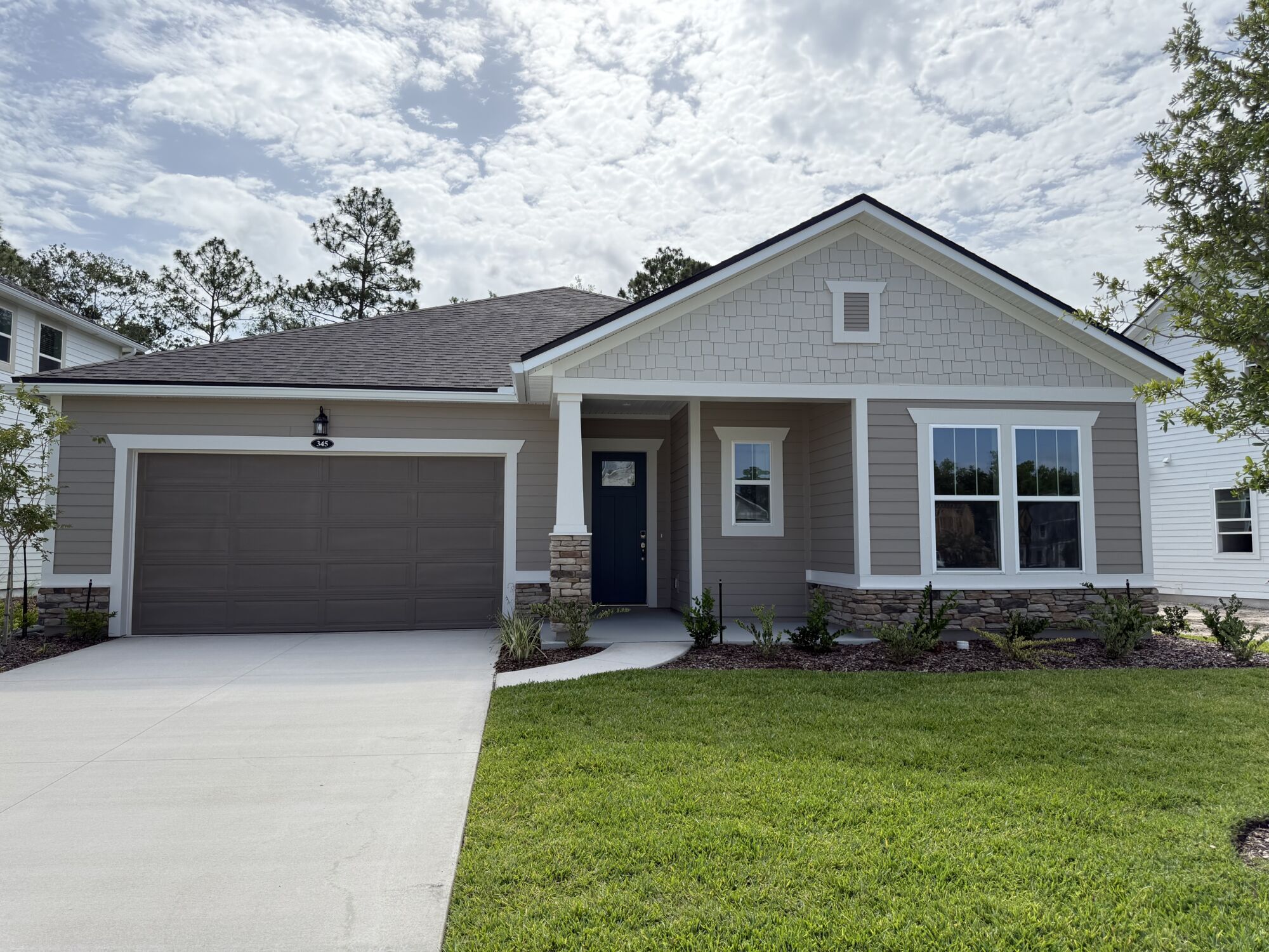  Elevation Front with garage, window and door