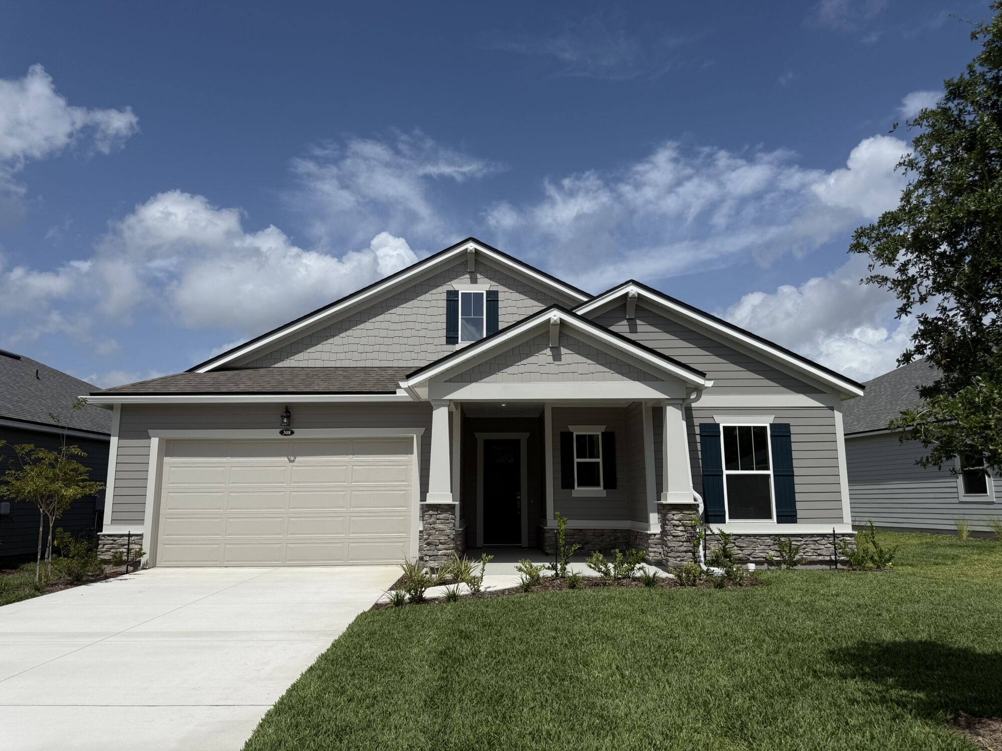  Elevation Front with window, garage and door