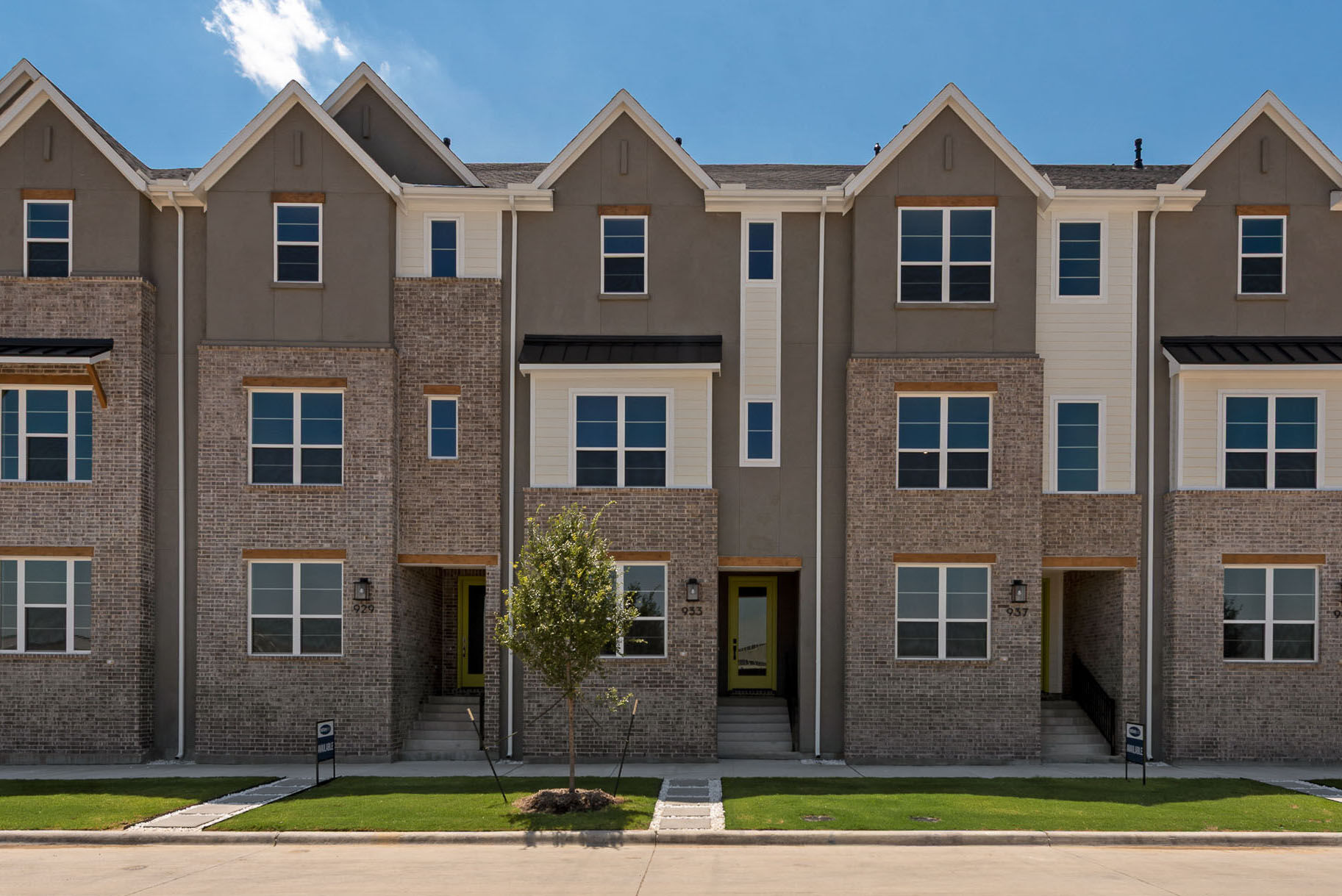 Town Homes with window, exterior brick and door