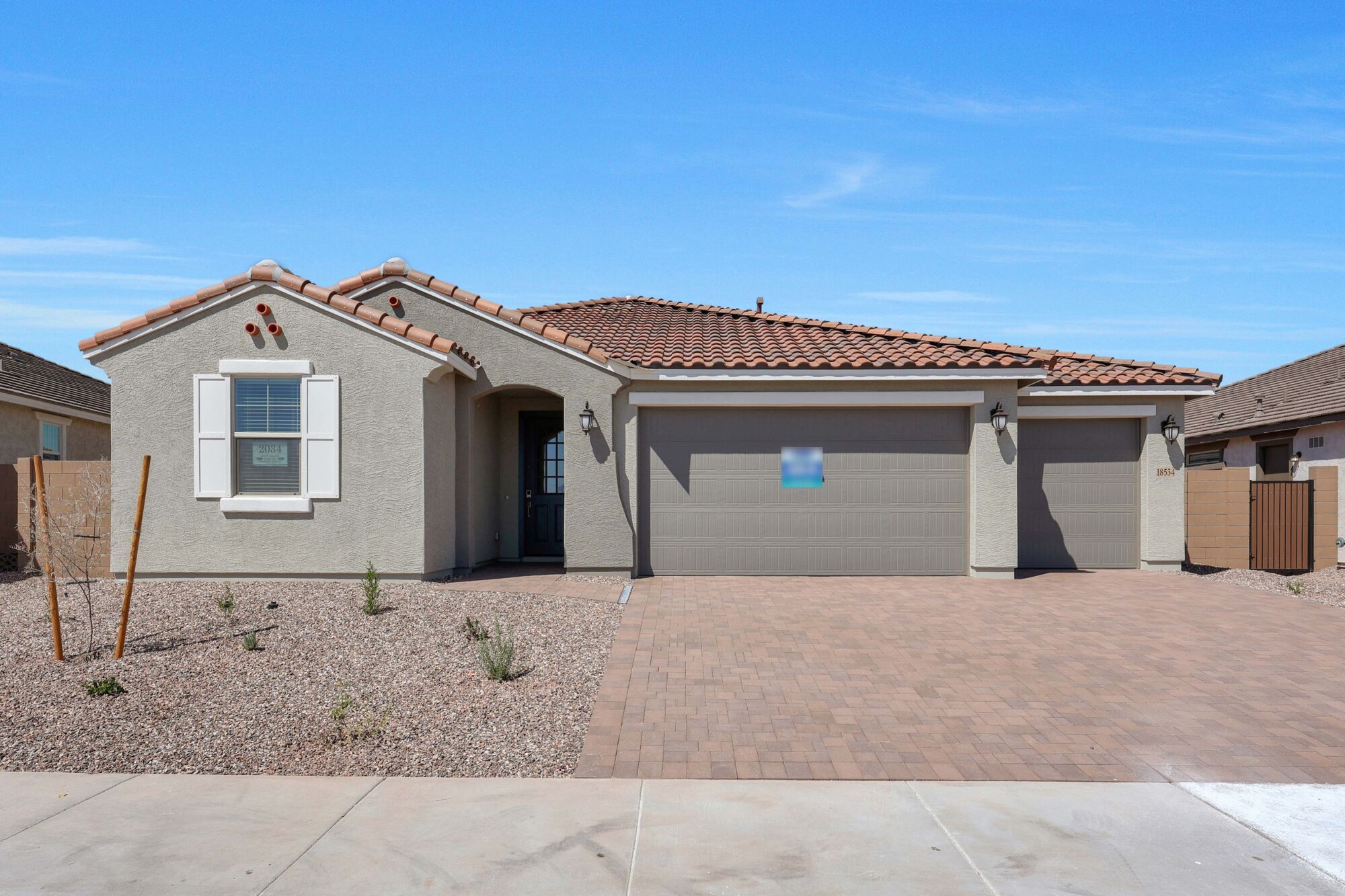 Elevation Front with window, garage and door