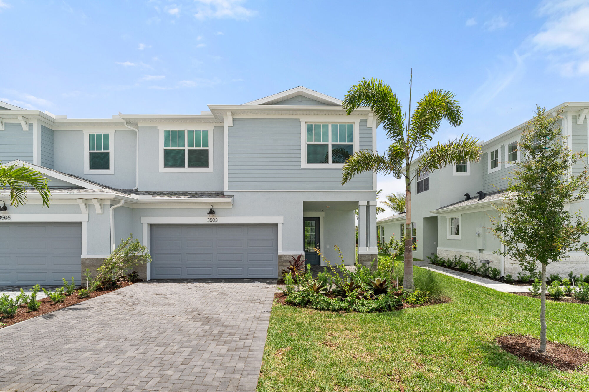  Town Homes with window, garage and door