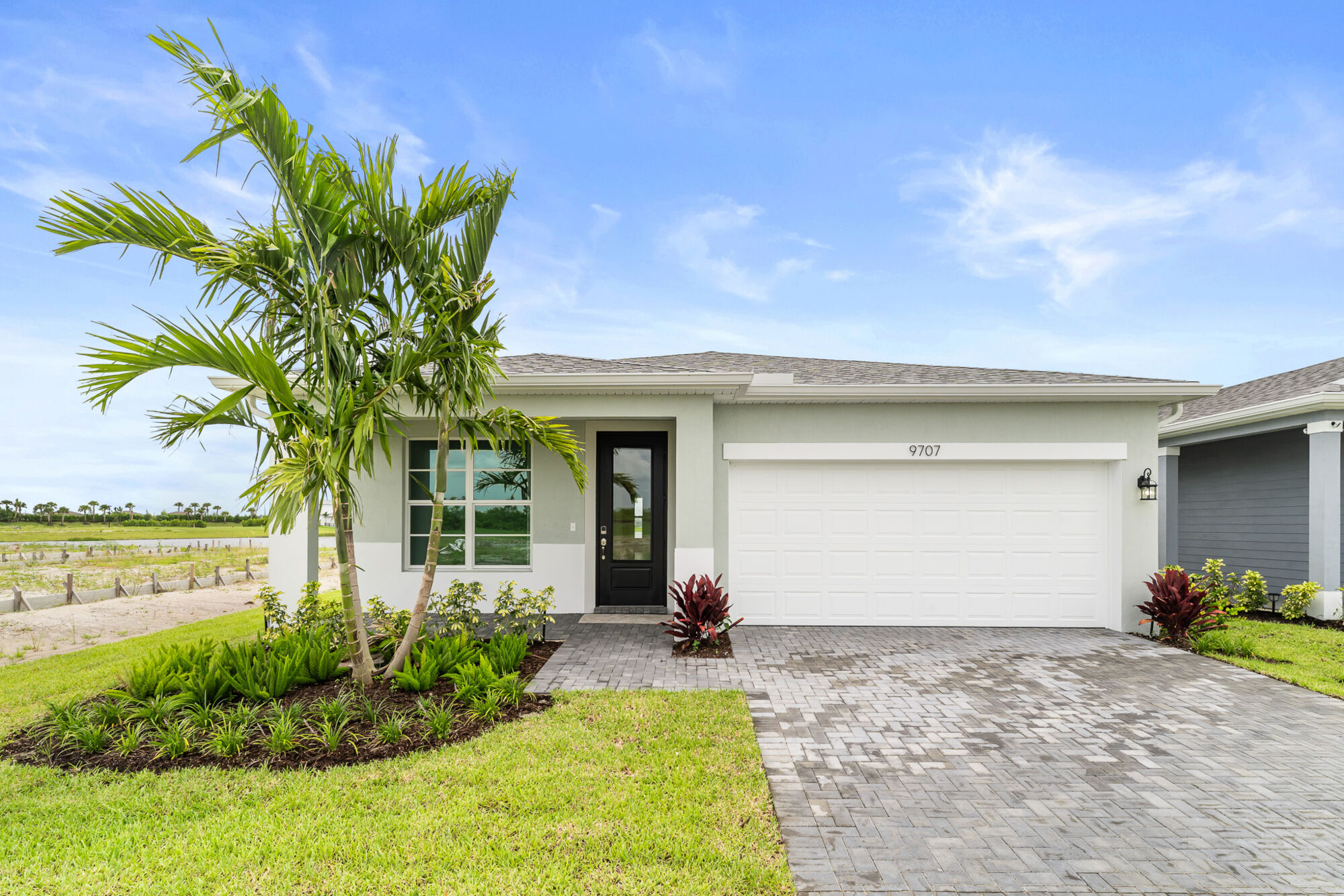  Elevation Front with garage, door and window