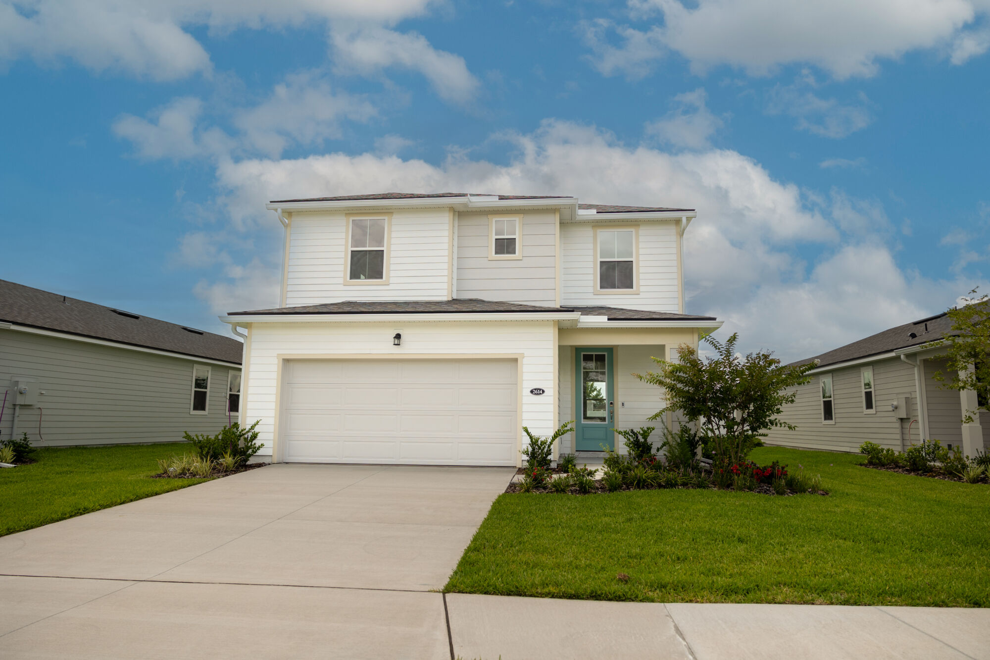 Elevation Front with window, garage and door