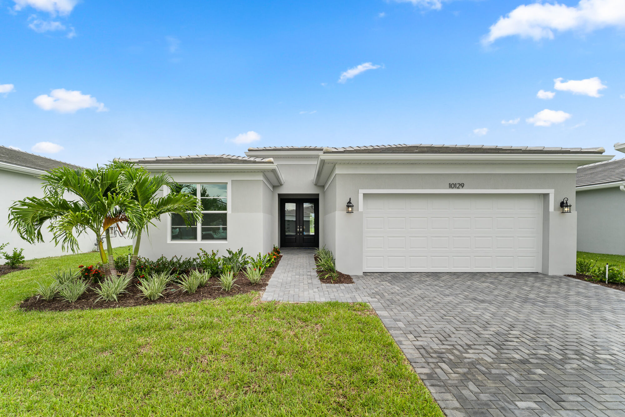  Elevation Front with garage, window and door