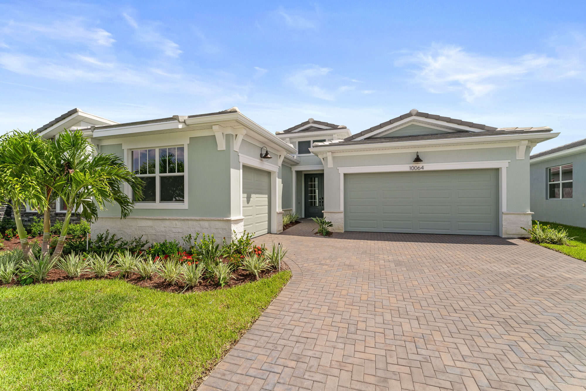 Elevation Front with garage, window and stone flooring