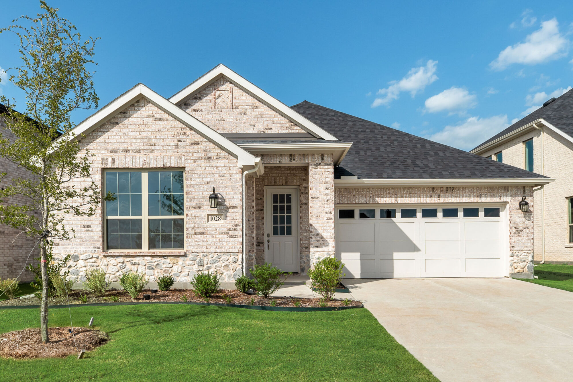 Elevation Front with garage, door and window