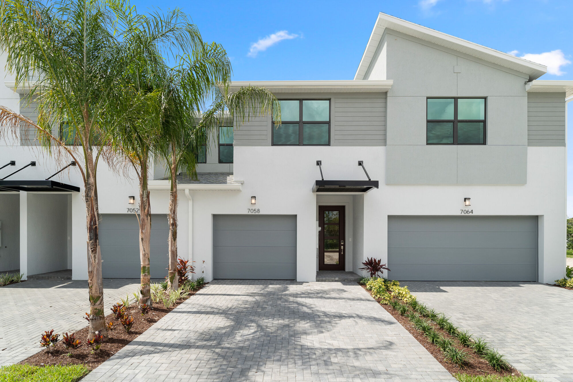  Town Homes with garage, window and door