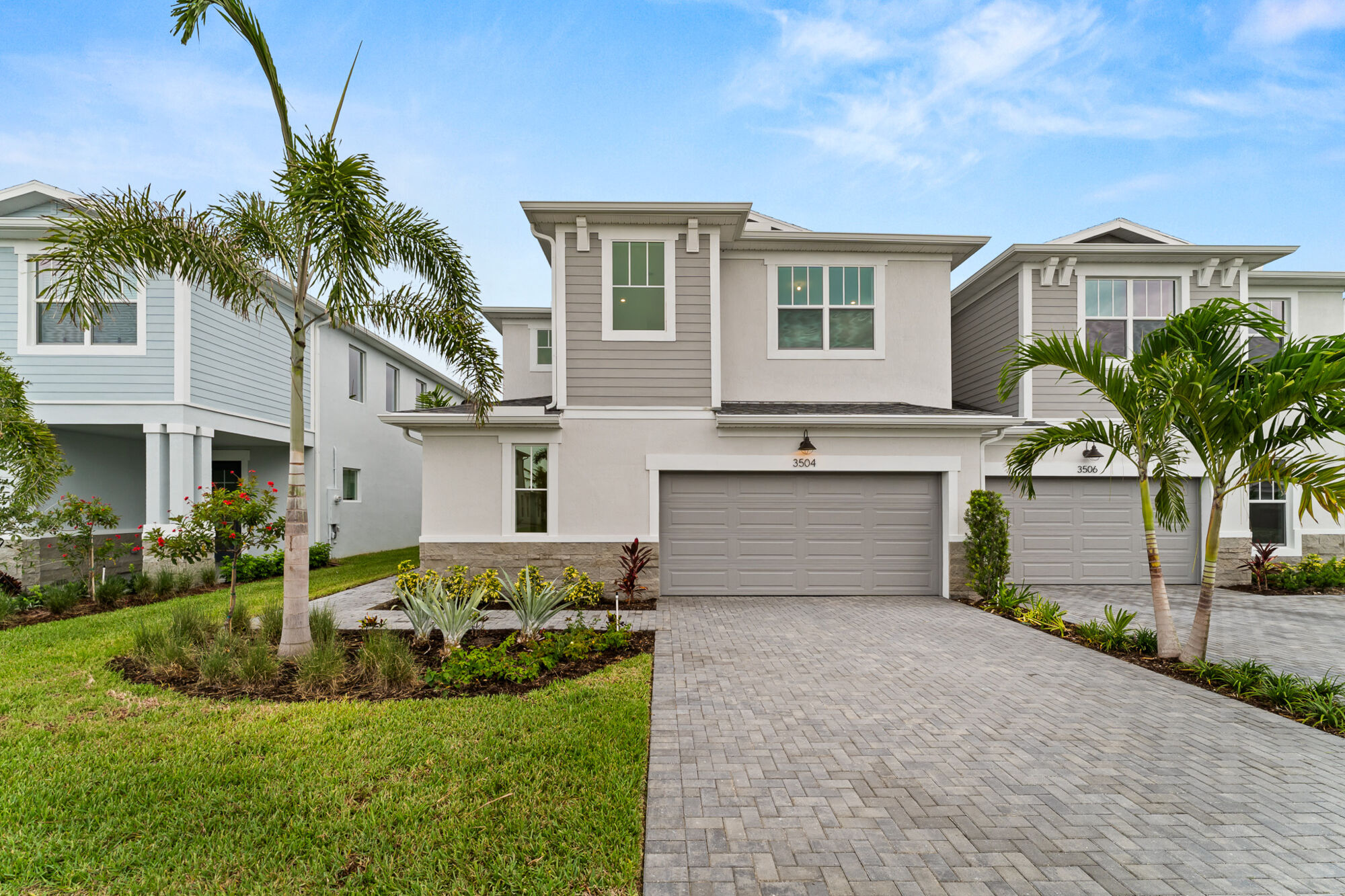  Town Homes with garage, window and exterior clapboard
