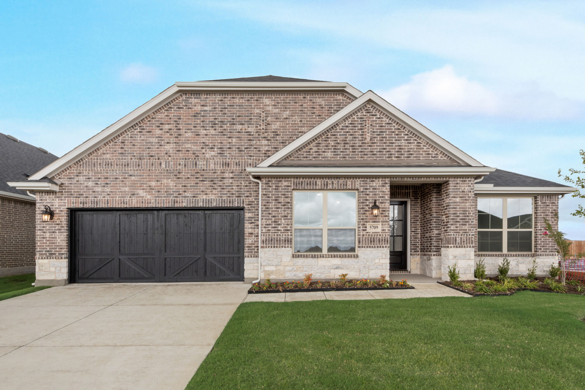 Elevation Front with garage, window and door