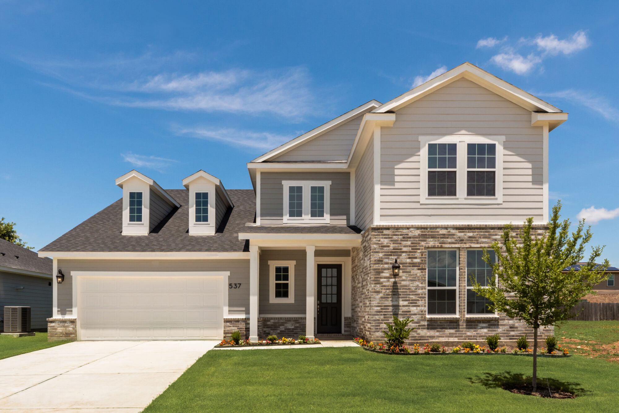 Elevation Front with window, garage and door