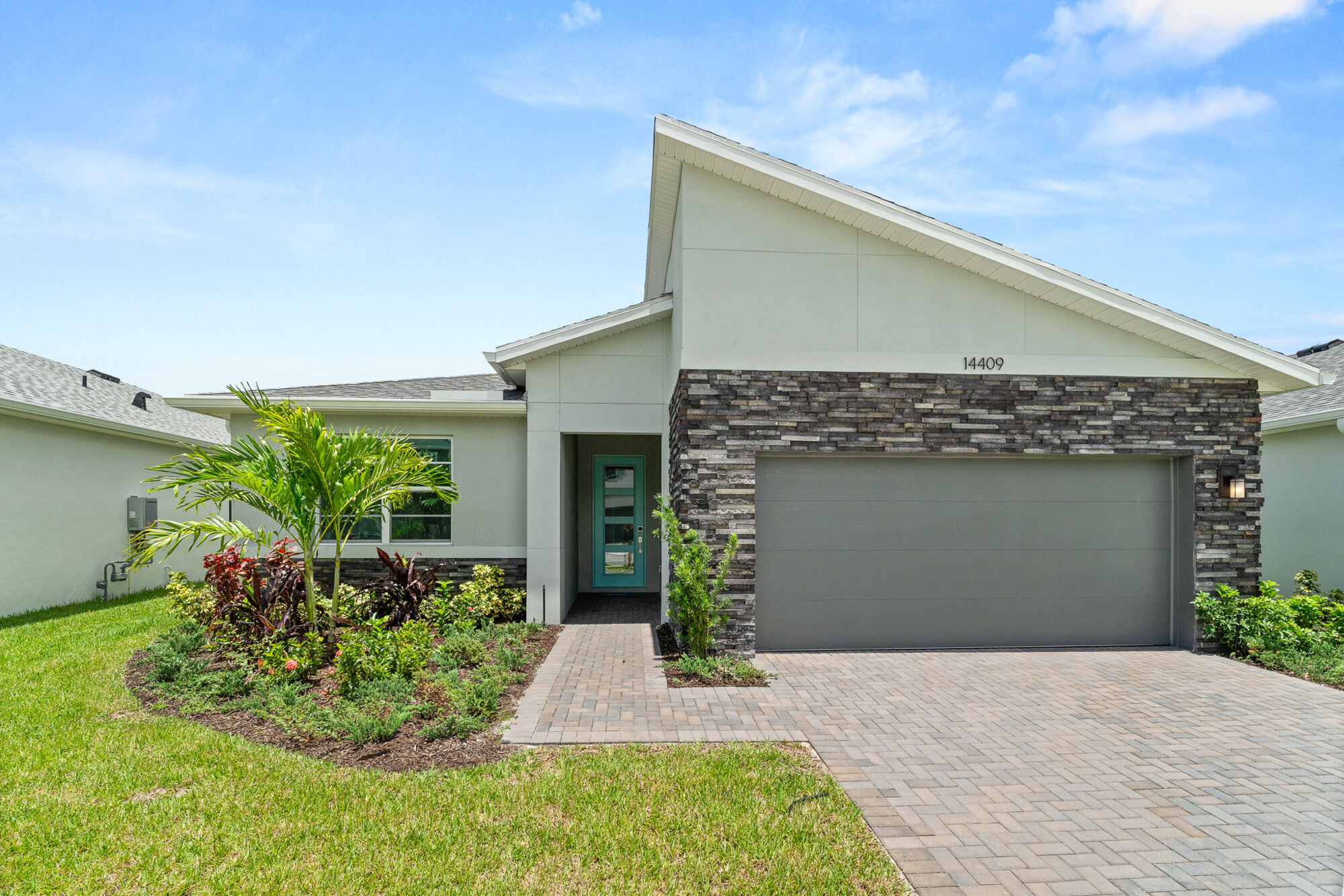  Elevation Front with garage and exterior stone
