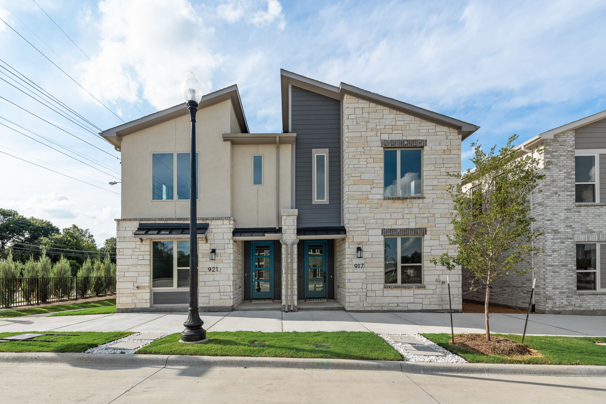 Elevation Front with window, exterior stone, exterior clapboard, exterior brick and door