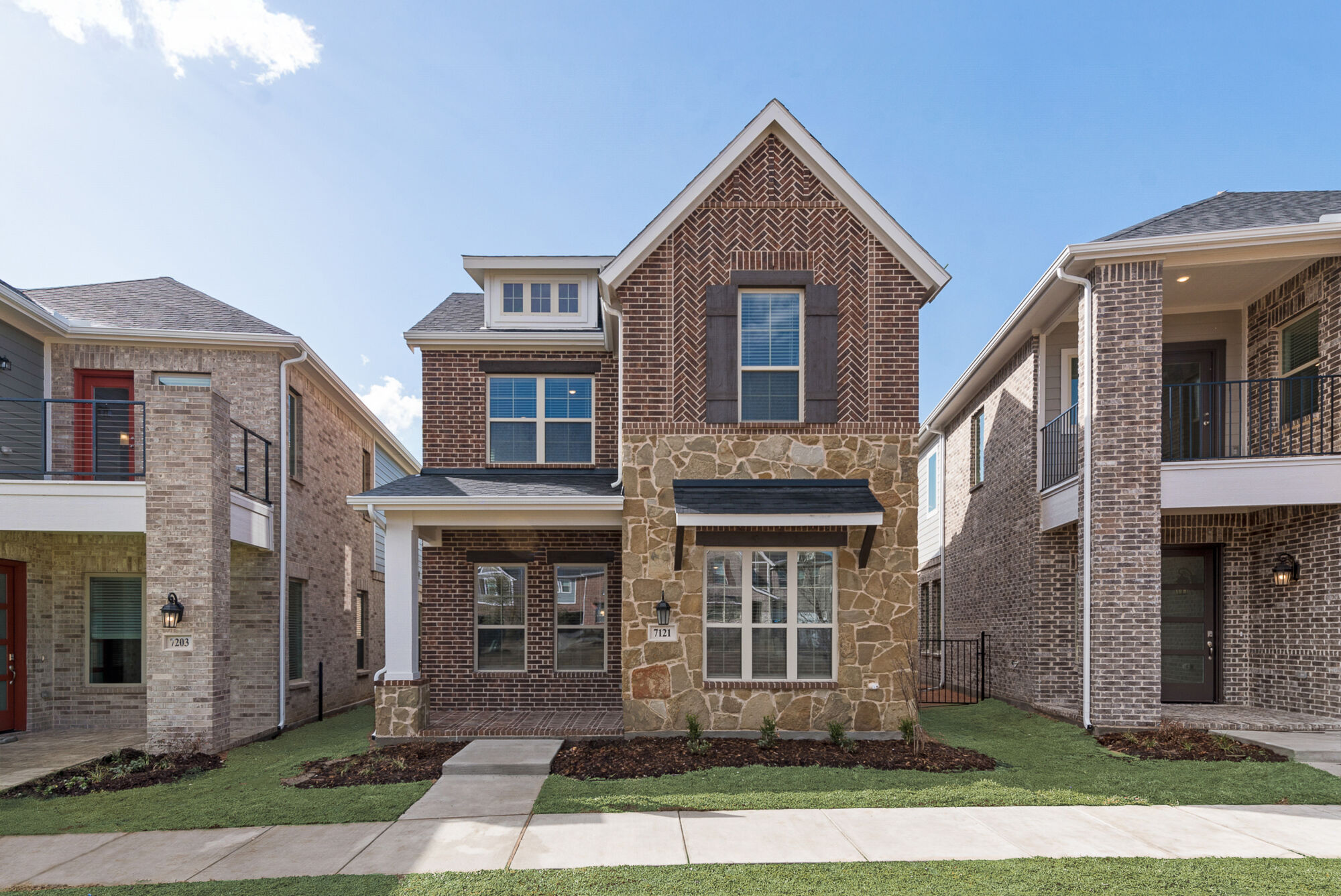 Elevation Front with window, painting, door, exterior brick and exterior stone