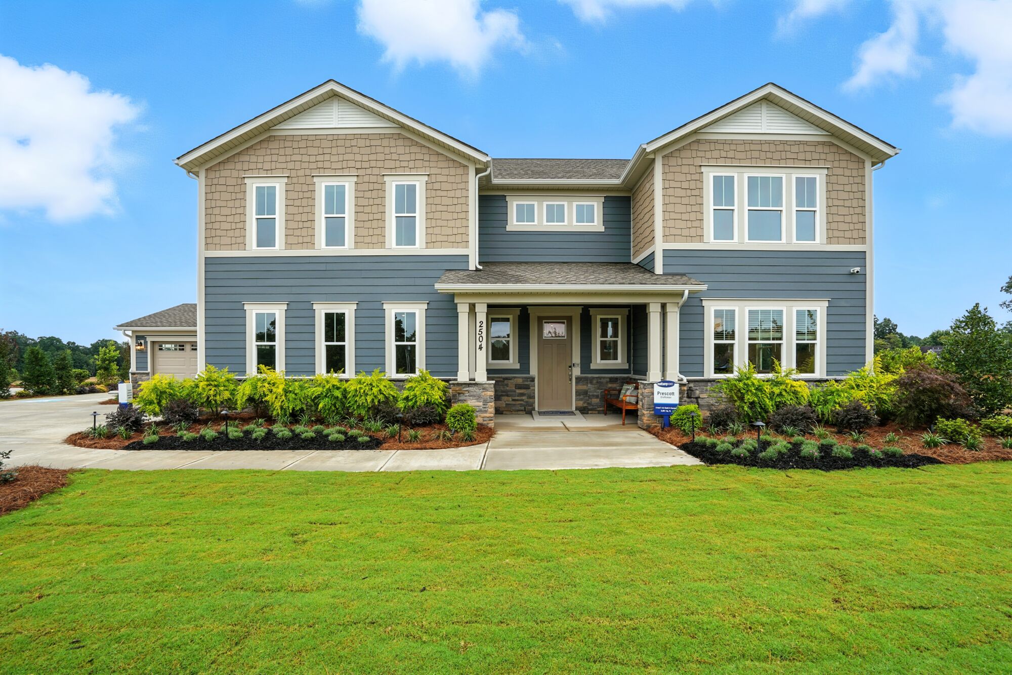  Elevation Front with window, door, exterior brick and exterior clapboard