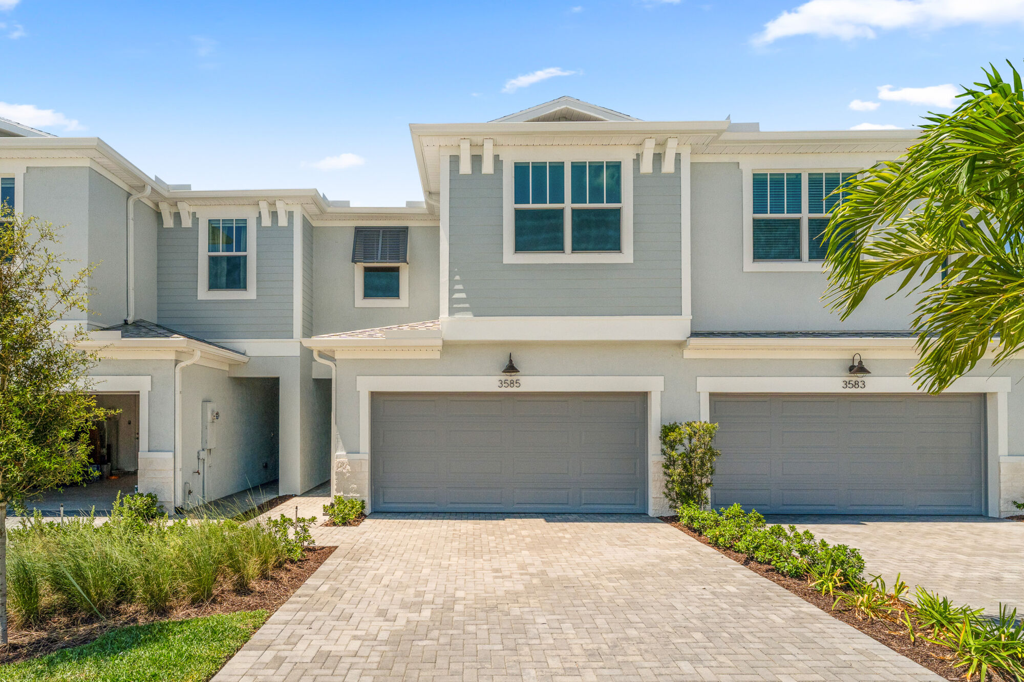  Town Homes with garage, window and exterior clapboard