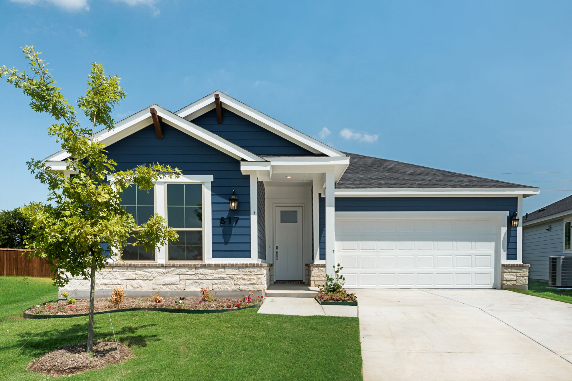Elevation Front with window, garage and door