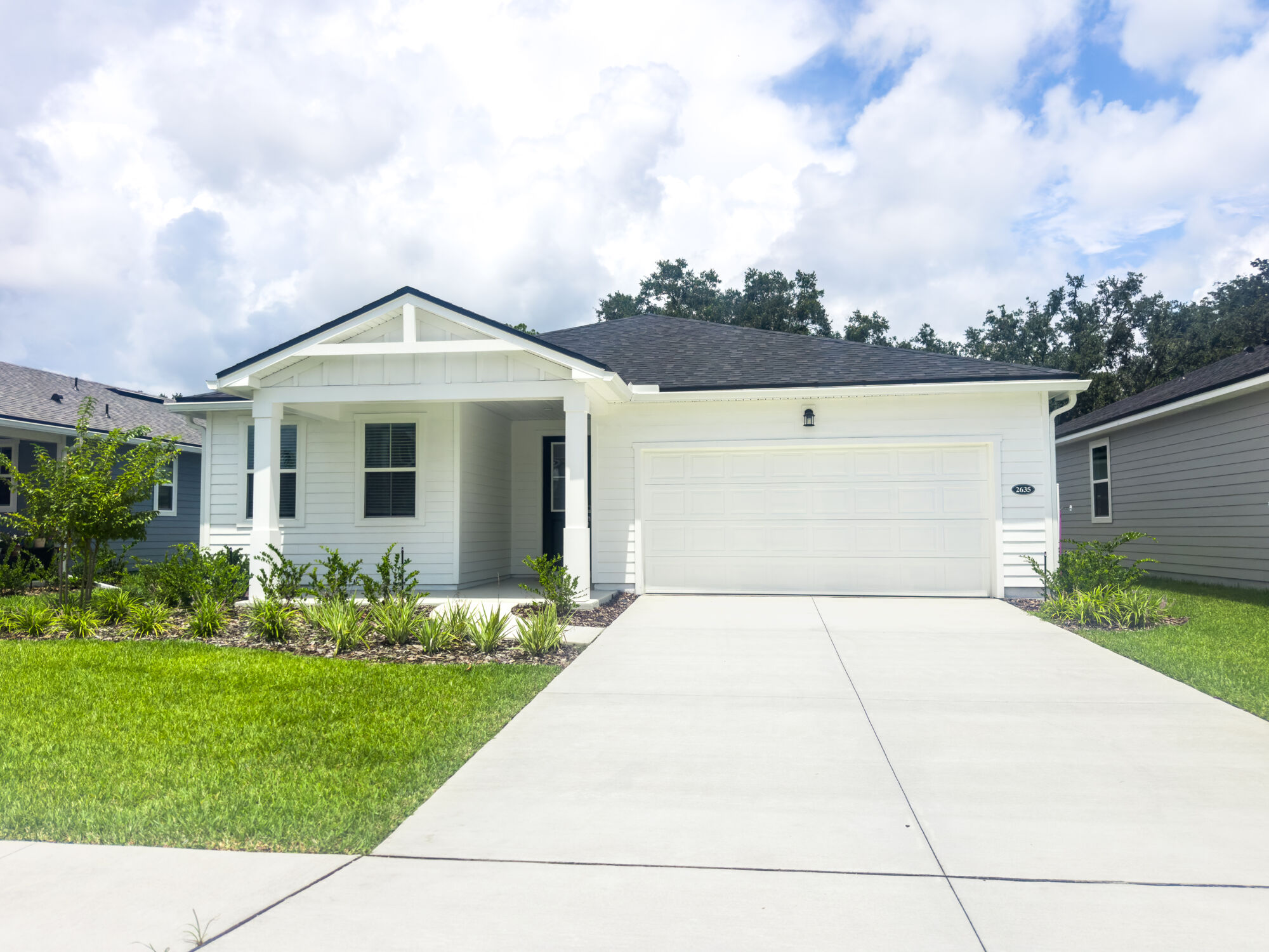 Elevation Front with window, garage and door