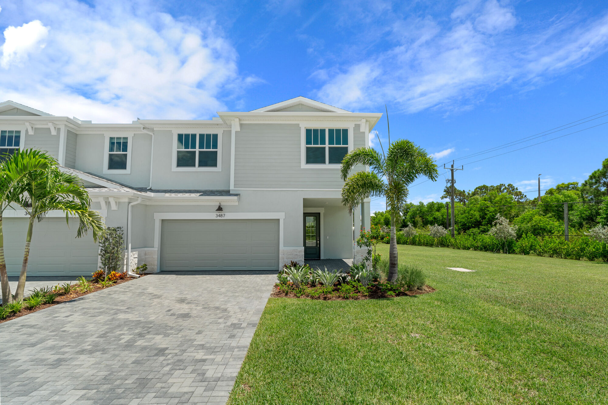  Town Homes with window, garage and door