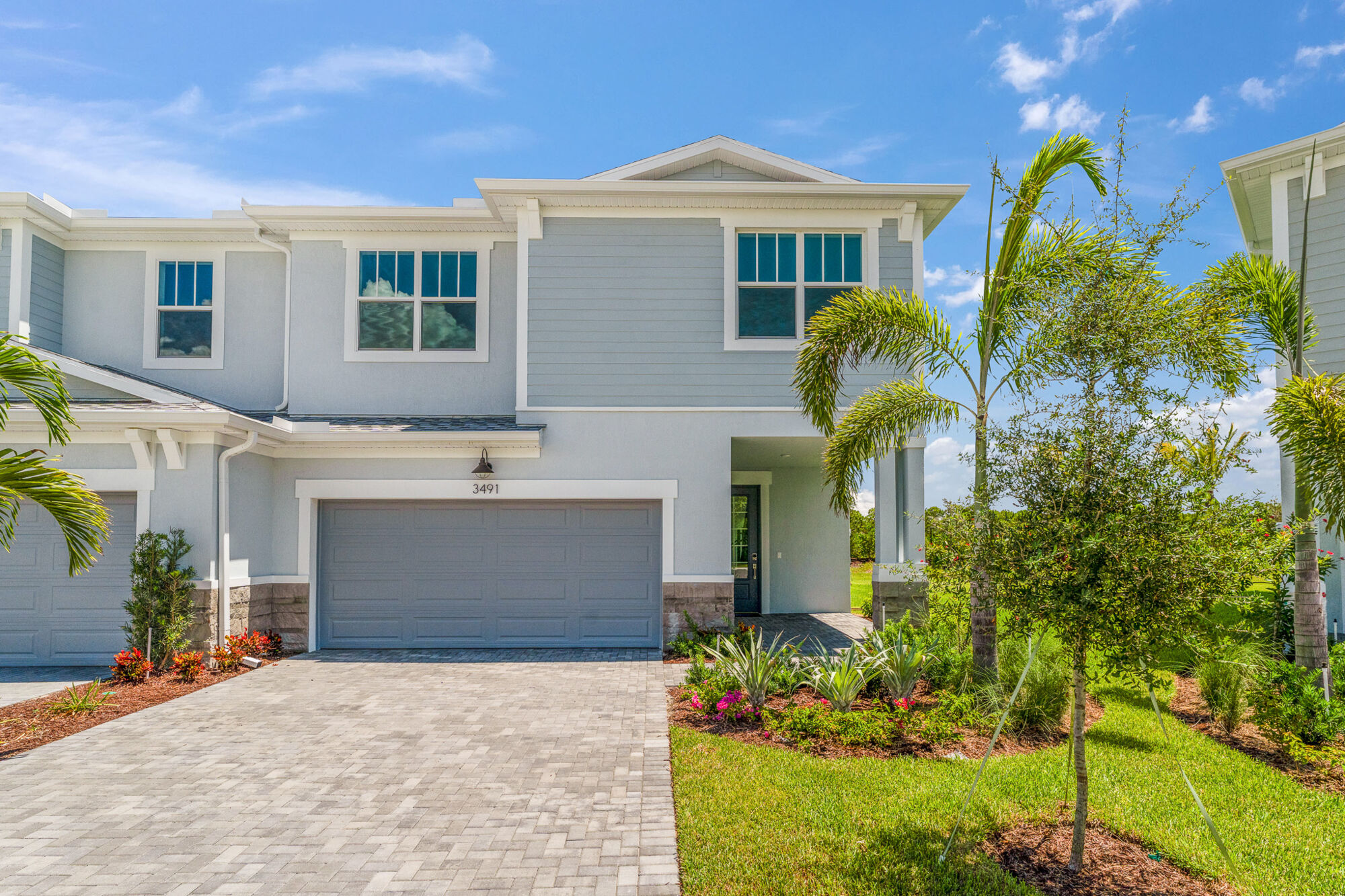  Town Homes with garage, window, exterior clapboard and exterior stone