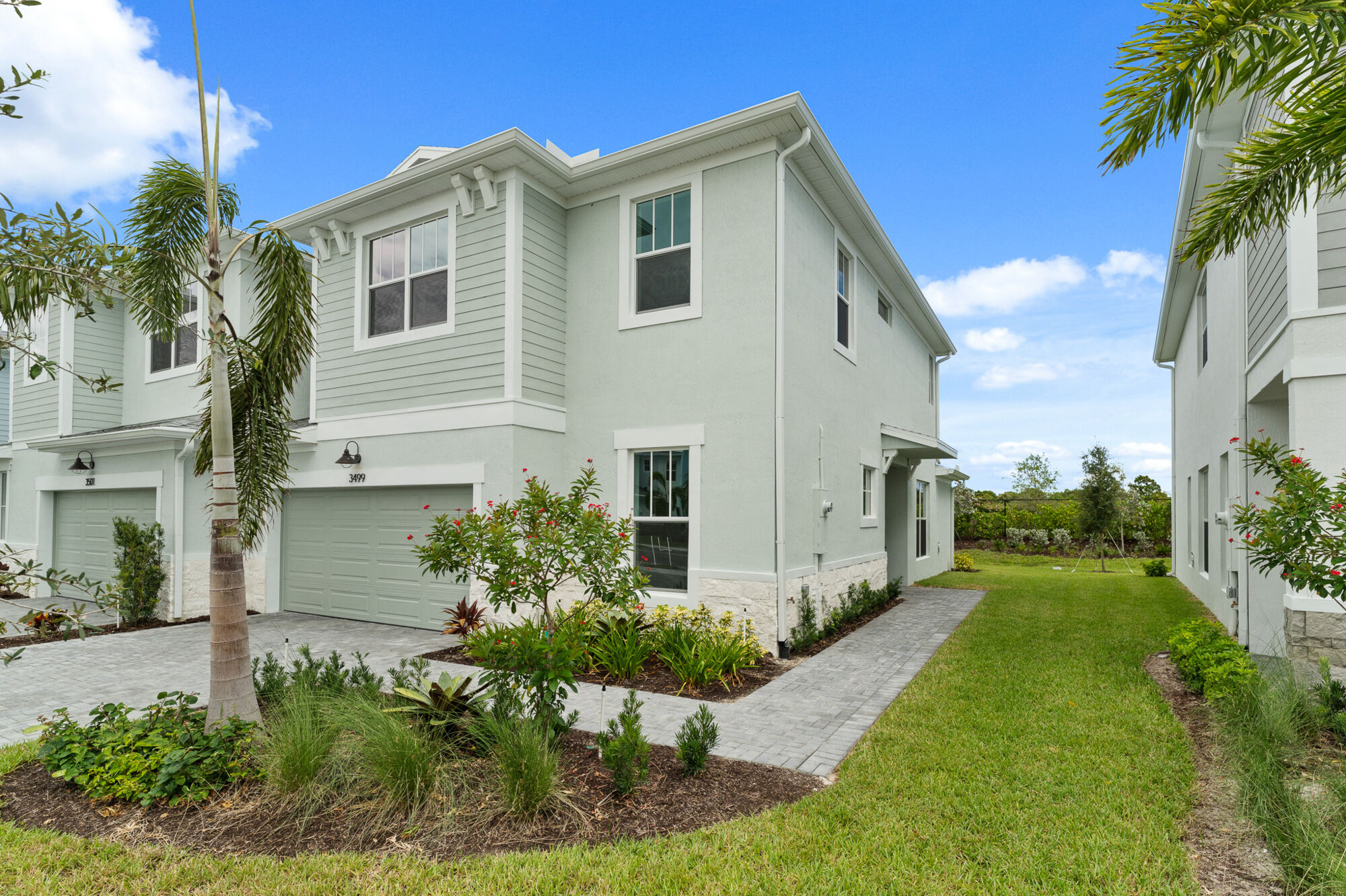  Elevation Front with window, garage and exterior clapboard